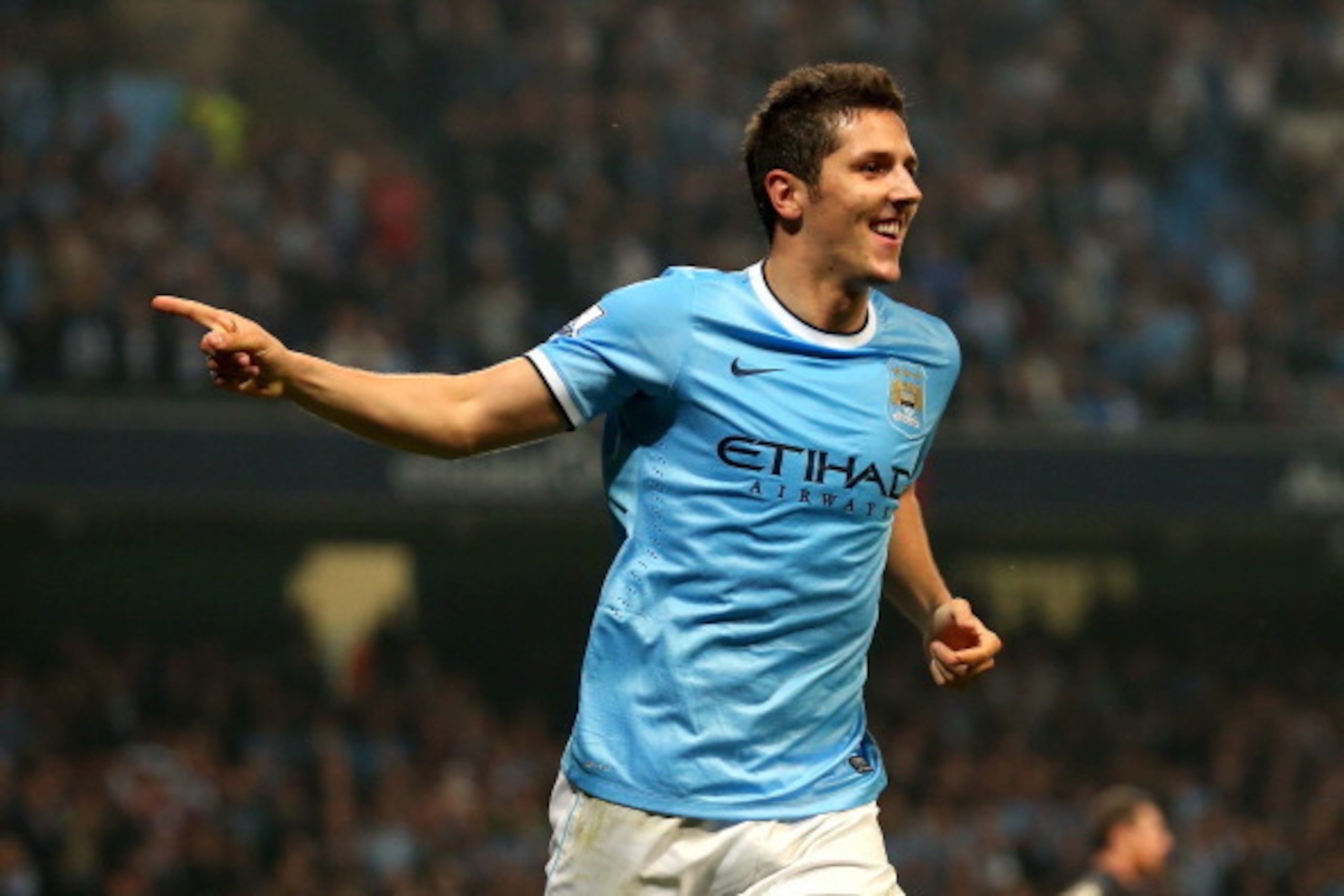 MANCHESTER, ENGLAND - SEPTEMBER 24:  Stevan Jovetic of Manchester City celebrates after scoring the fourth goal during the Capital One Cup third round match between Manchester City and Wigan Athletic at Etihad Stadium on September 24, 2013 in Manchester, 
