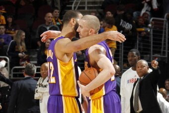 CLEVELAND, OH - FEBRUARY 5:  Steve Blake #5 and Kendall Marshall #12 of the Los Angeles Lakers celebrate after a game against the Cleveland Cavaliers at The Quicken Loans Arena on February 5, 2014 in Cleveland, Ohio. NOTE TO USER: User expressly acknowled