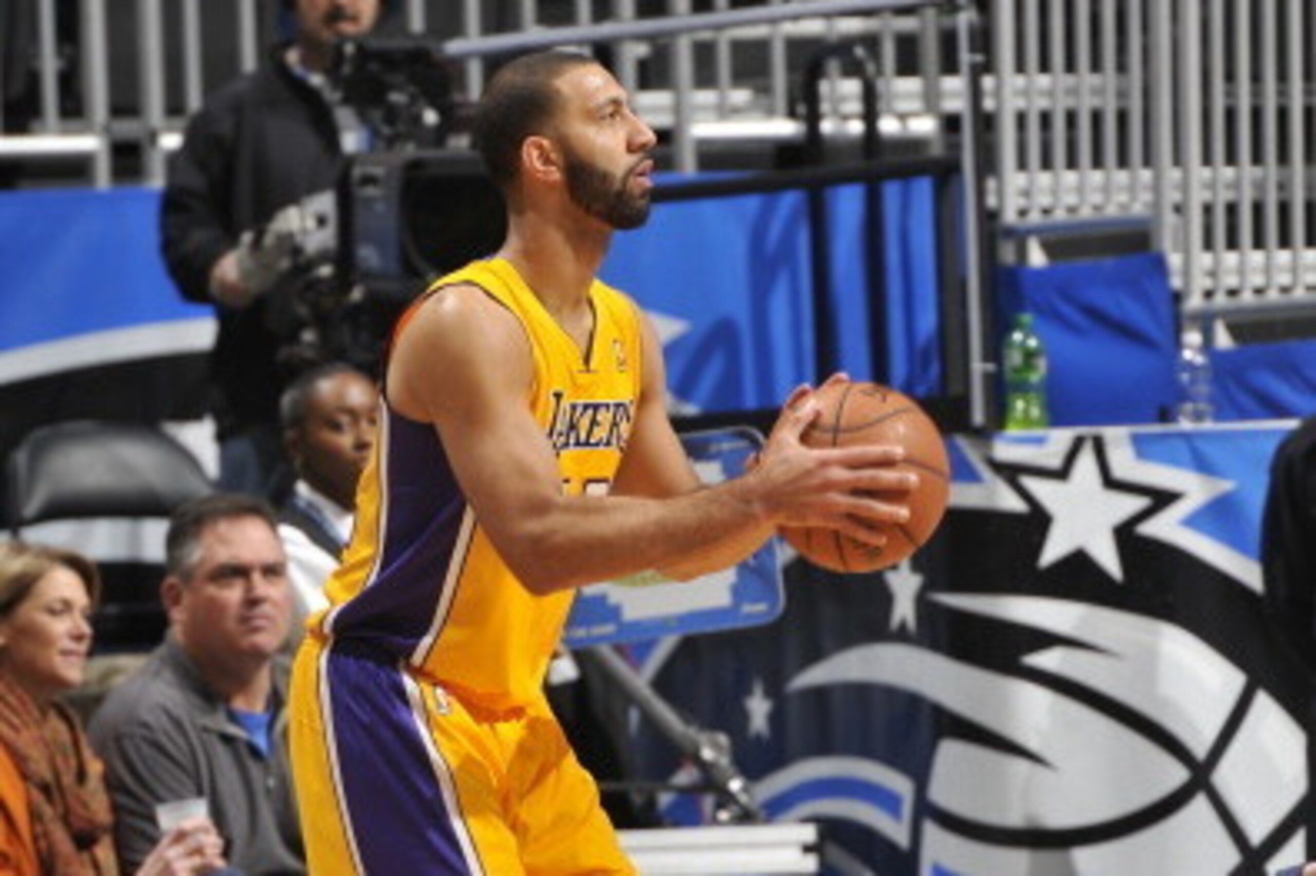 ORLANDO, FL - JANUARY 24: Kendall Marshall #12 of the Los Angeles Lakers shoots against the Orlando Magic on January 24, 2014 at Amway Center in Orlando, Florida. NOTE TO USER: User expressly acknowledges and agrees that, by downloading and or using this 