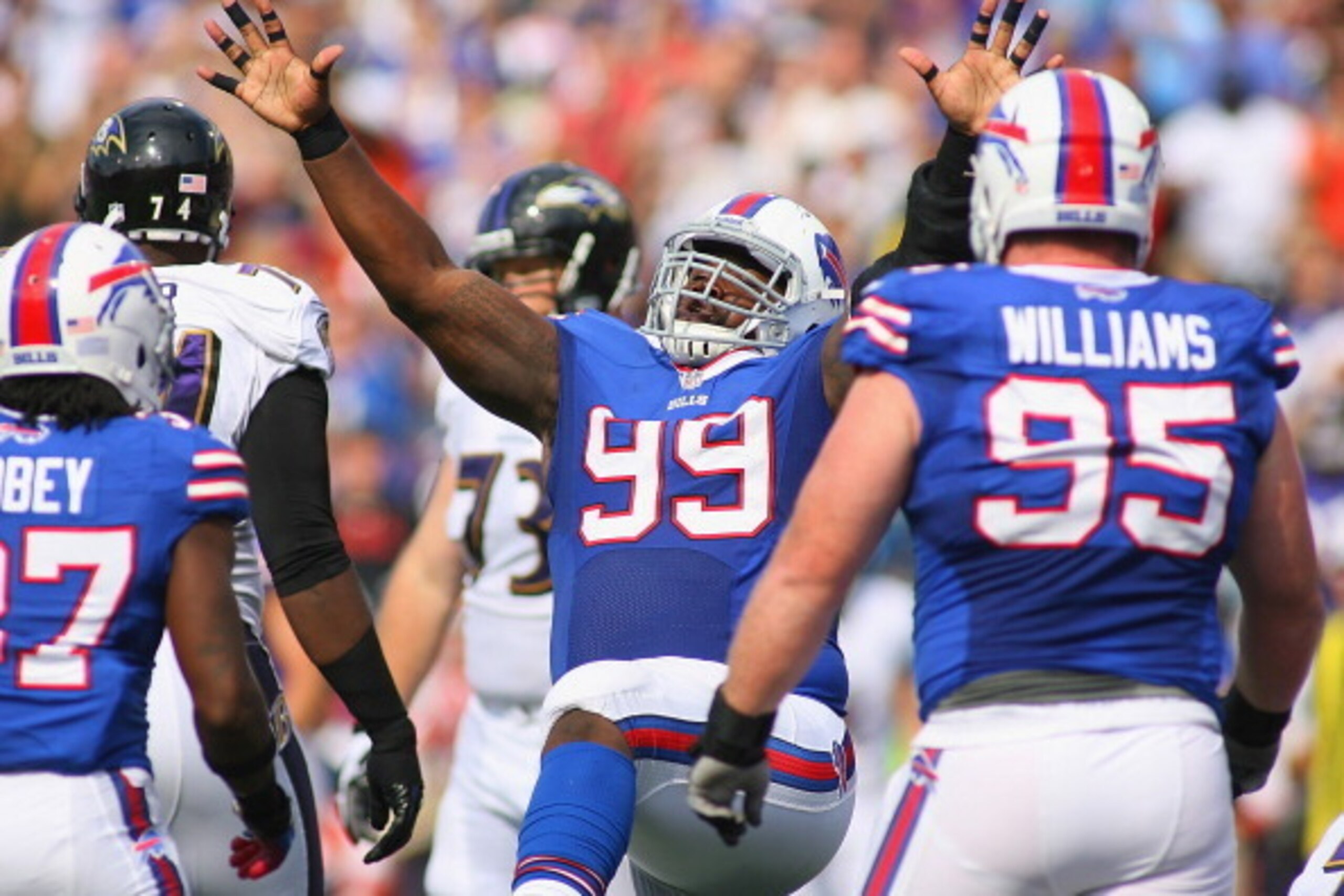 ORCHARD PARK, NY - SEPTEMBER 29:  Marcell Dareus #99 of the Buffalo Bills celebrates one of his two sacks against the Baltimore Ravens at Ralph Wilson Stadium on September 29, 2013 in Orchard Park, New York.Buffalo won 23-20.  (Photo by Rick Stewart/Getty