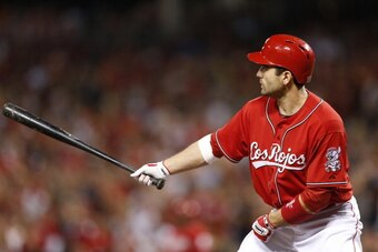 CINCINNATI, OH - SEPTEMBER 27: Joey Votto #19 of the Cincinnati Reds bats against the Pittsburgh Pirates during the game at Great American Ball Park on September 27, 2013 in Cincinnati, Ohio. The Pirates won 4-1. (Photo by Joe Robbins/Getty Images)