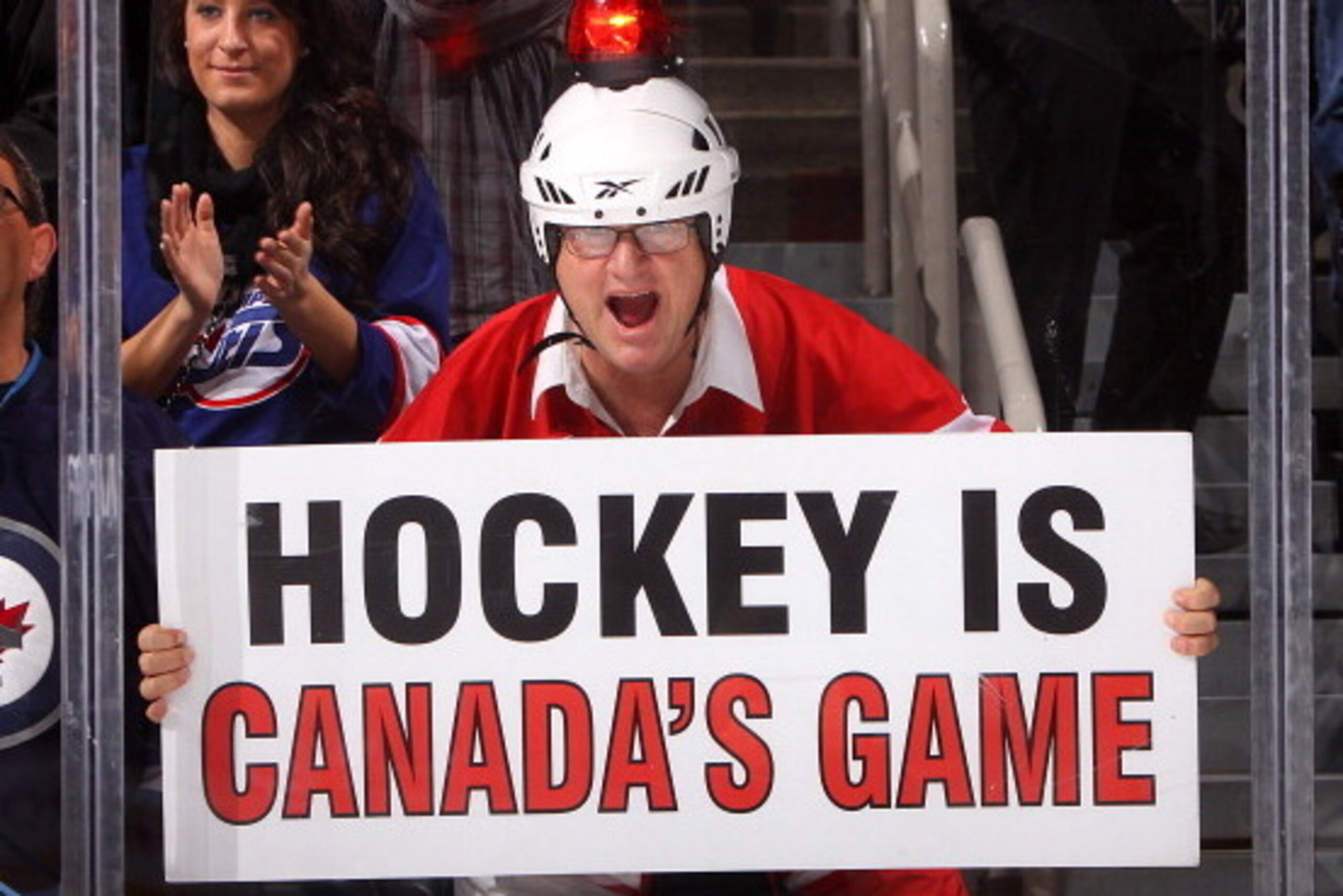 WINNIPEG, CANADA - DECEMBER 23: A fan holds up a sign prior to the game between the Winnipeg Jets and the Pittsburgh Penguins at the MTS Centre on December 23, 2011 in Winnipeg, Manitoba, Canada. (Photo by Jonathan Kozub/NHLI via Getty Images)