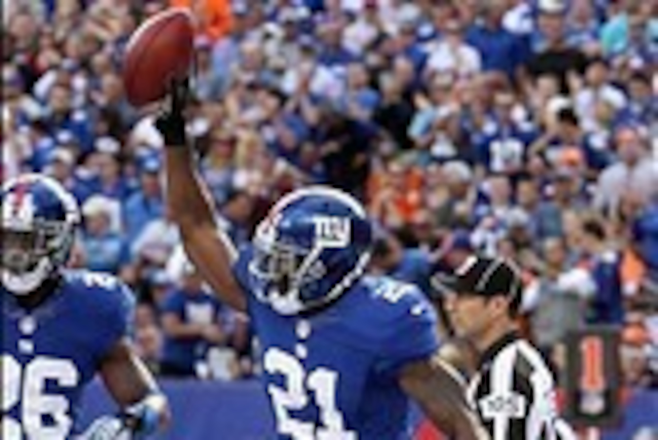 Sep 15, 2013; East Rutherford, NJ, USA; New York Giants safety Ryan Mundy (21) celebrates after falling on a Denver Broncos fumble in the end zone during the first quarter of a game at MetLife Stadium. Mandatory Credit: Brad Penner-USA TODAY Sports