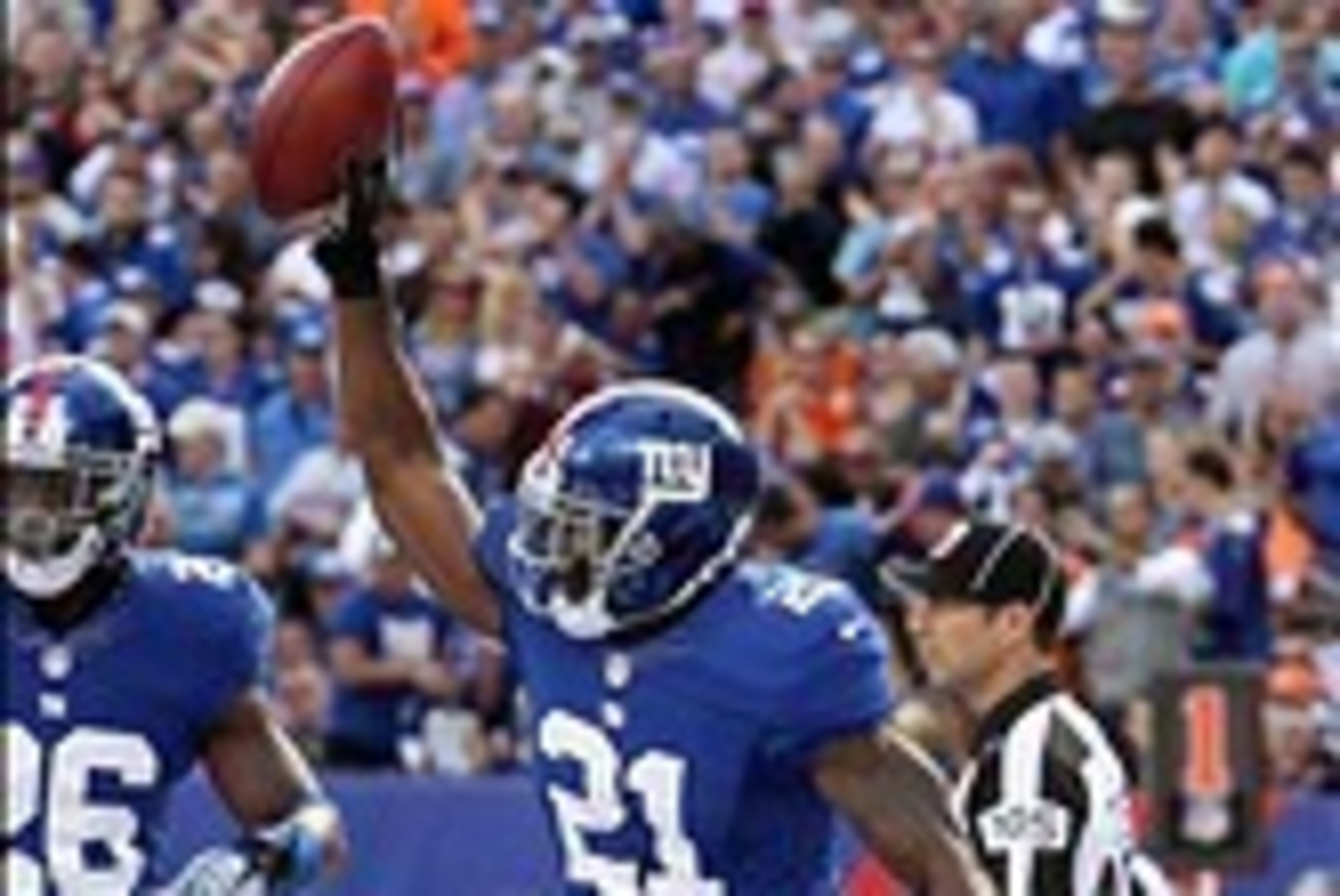 Sep 15, 2013; East Rutherford, NJ, USA; New York Giants safety Ryan Mundy (21) celebrates after falling on a Denver Broncos fumble in the end zone during the first quarter of a game at MetLife Stadium. Mandatory Credit: Brad Penner-USA TODAY Sports