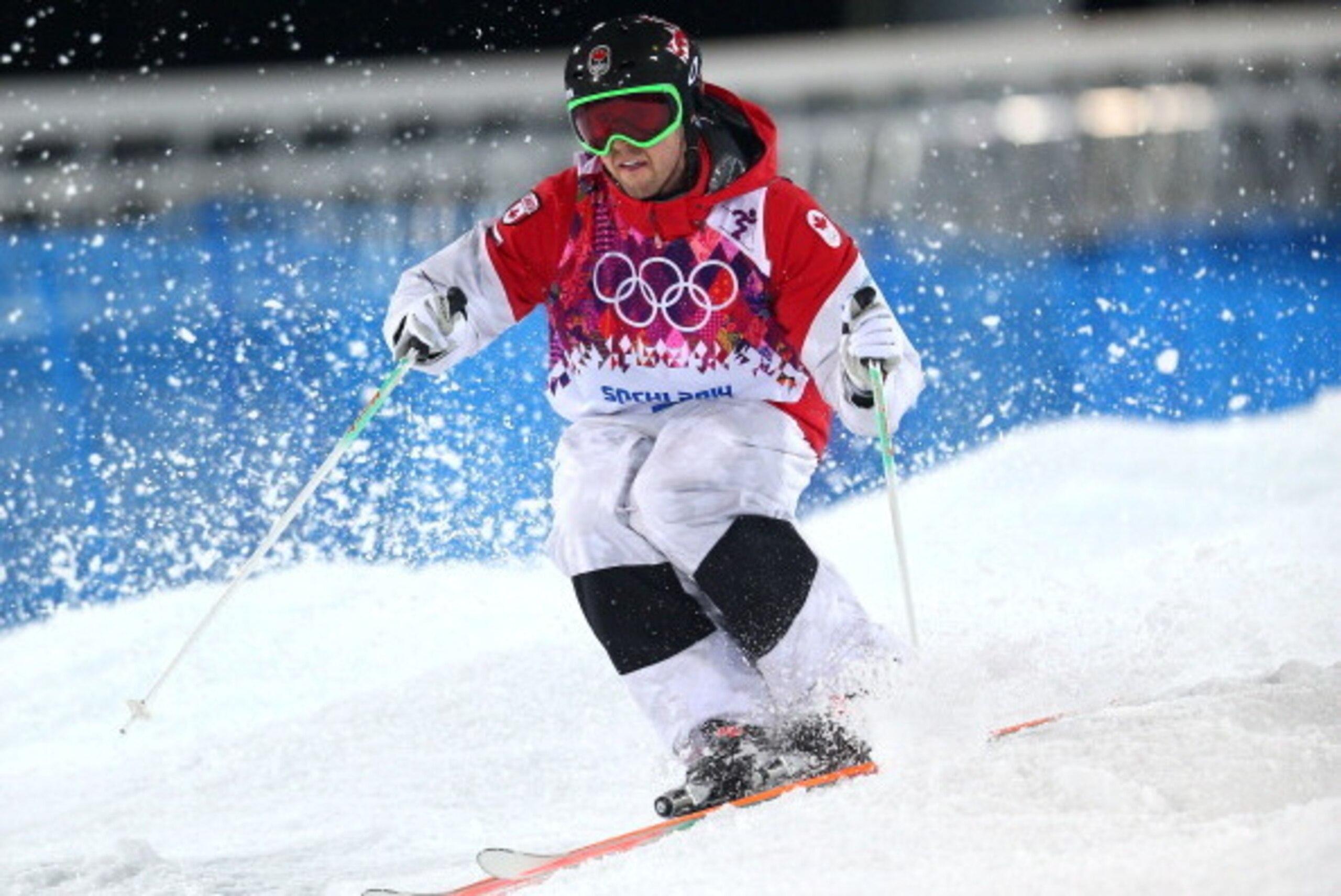 SOCHI, RUSSIA - FEBRUARY 10:  Alex Bilodeau of Canada competes in the Men's Moguls Finals on day three of the Sochi 2014 Winter Olympics at Rosa Khutor Extreme Park on February 10, 2014 in Sochi, Russia.  (Photo by Mike Ehrmann/Getty Images)