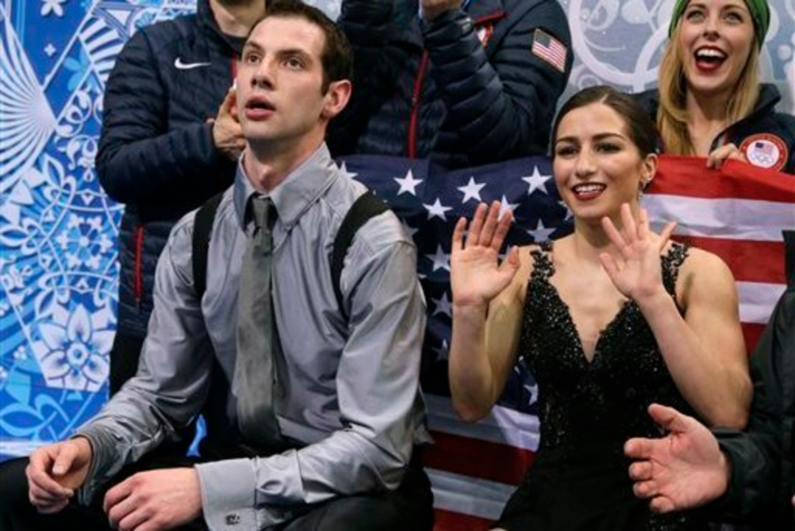 Shnapir and Castelli get their scores during the team competition.