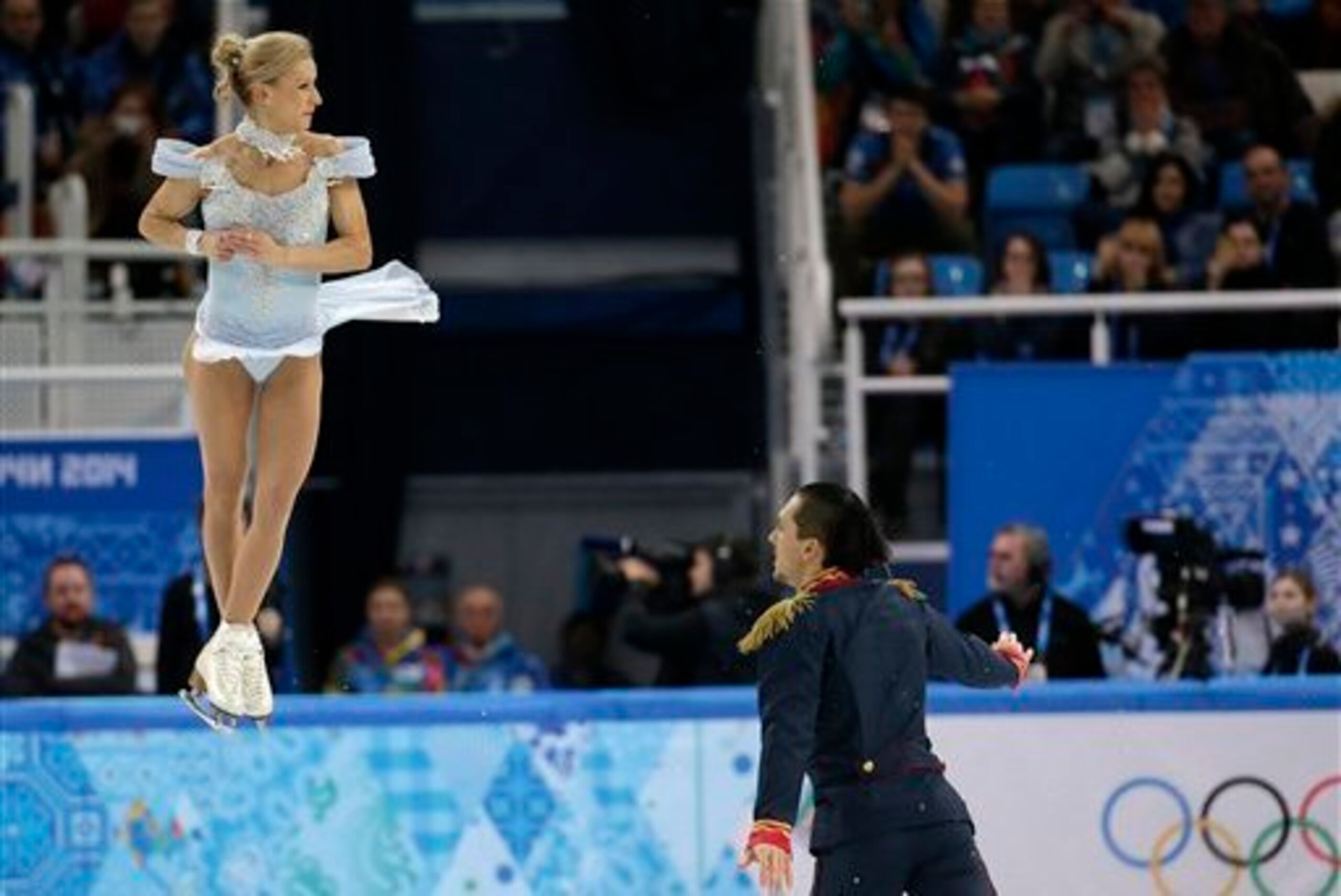 Maxim Trankov and Tatiana Volosozhar skate in the pairs short program.