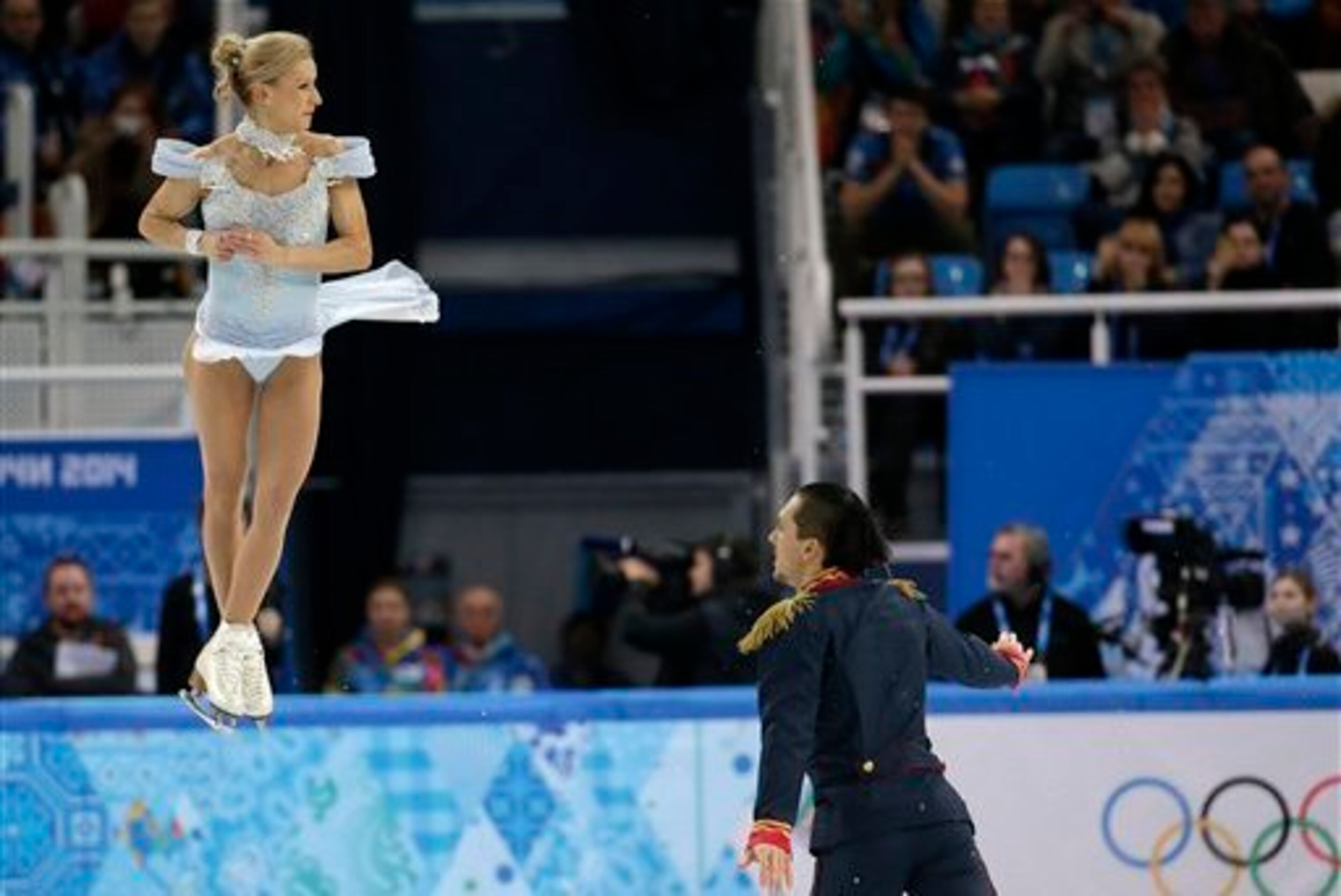 Maxim Trankov and Tatiana Volosozhar skate in the pairs short program.
