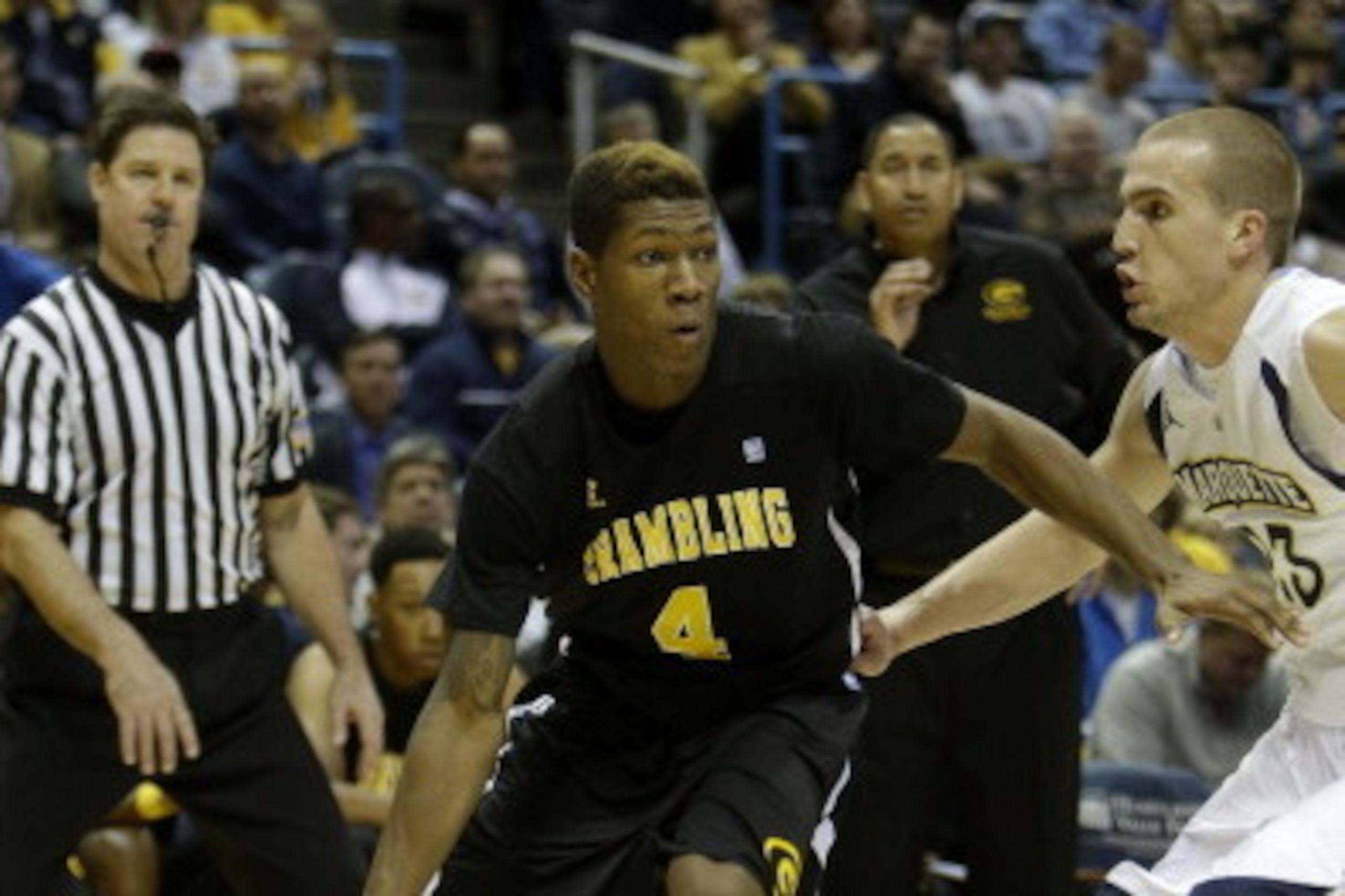 MILWAUKEE, WI - NOVEMBER 12: Remond Brown #4 of the Grambling State Tigers drives to the hoop during the second half against the Marquette Golden Eagles at BMO Harris Bradley Center on November 12, 2013 in Madison, Wisconsin. (Photo by Mike McGinnis/Getty