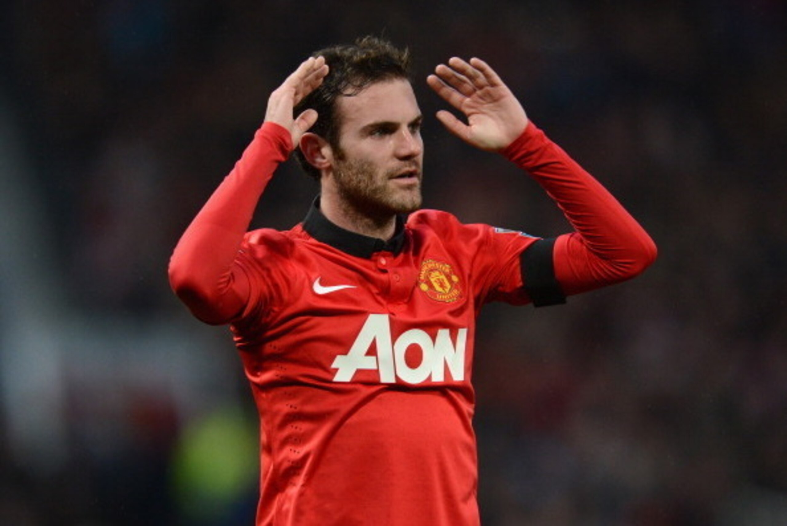 MANCHESTER, ENGLAND - FEBRUARY 09:  Juan Mata of Manchester United reacts during the Barclays Premier League match between Manchester United and Fulham at Old Trafford on February 9, 2014 in Manchester, England.  (Photo by Michael Regan/Getty Images)