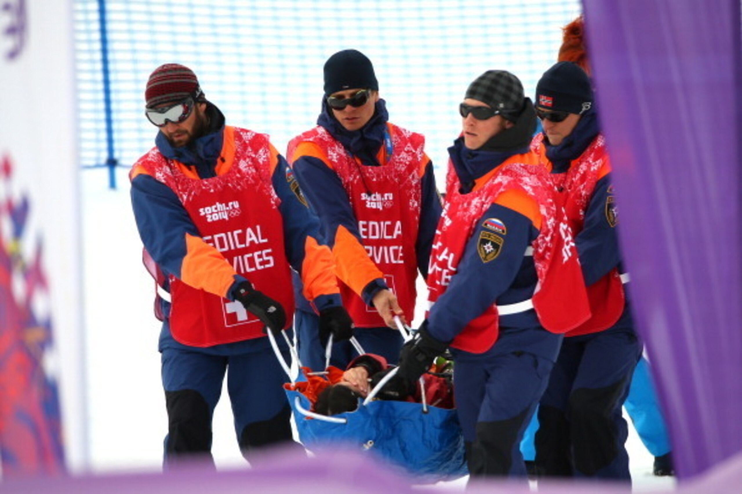 SOCHI, RUSSIA - FEBRUARY 11: Yuki Tsubota of Canada is carried off the course after a crash in the Freestyle Skiing Women's Ski Slopestyle Finals on day four of the Sochi 2014 Winter Olympics at Rosa Khutor Extreme Park on February 11, 2014 in Sochi, Rus SOCHI, RUSSIA - FEBRUARY 11: Yuki Tsubota of Canada is carried off the course after a crash in the Freestyle Skiing Women's Ski Slopestyle Finals on day four of the Sochi 2014 Winter Olympics at Rosa Khutor Extreme Park on February 11, 2014 in Sochi, Rus