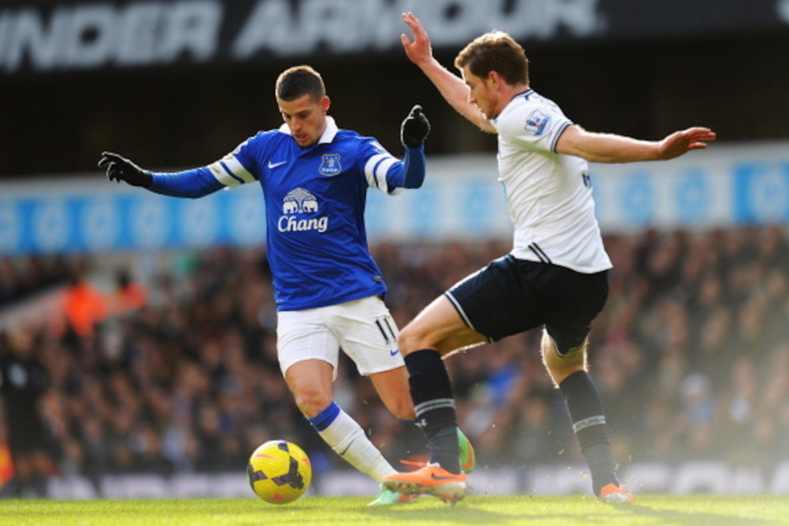 LONDON, ENGLAND - FEBRUARY 09:  Jan Vertonghen (R) of Tottenham Hotspur tackles Kevin Mirallas (L) of Everton during the Barclays Premier League match between Tottenham Hotspur and Everton at White Hart Lane on February 9, 2014 in London, England.  (Photo