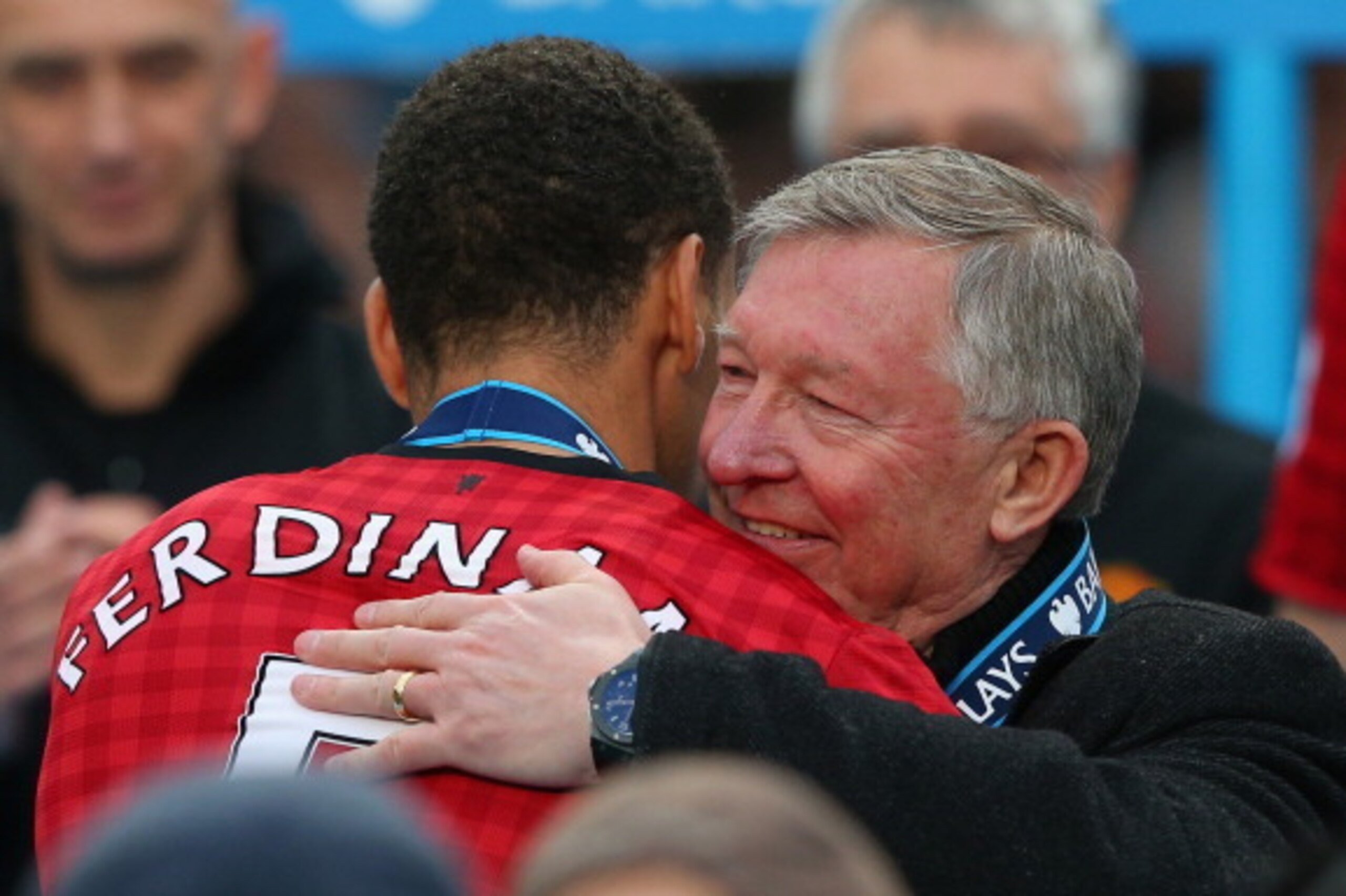 MANCHESTER, ENGLAND - MAY 12:  Manchester United Manager Sir Alex Ferguson embraces Rio Ferdinand following the Barclays Premier League match between Manchester United and Swansea City at Old Trafford on May 12, 2013 in Manchester, England.  (Photo by Ale