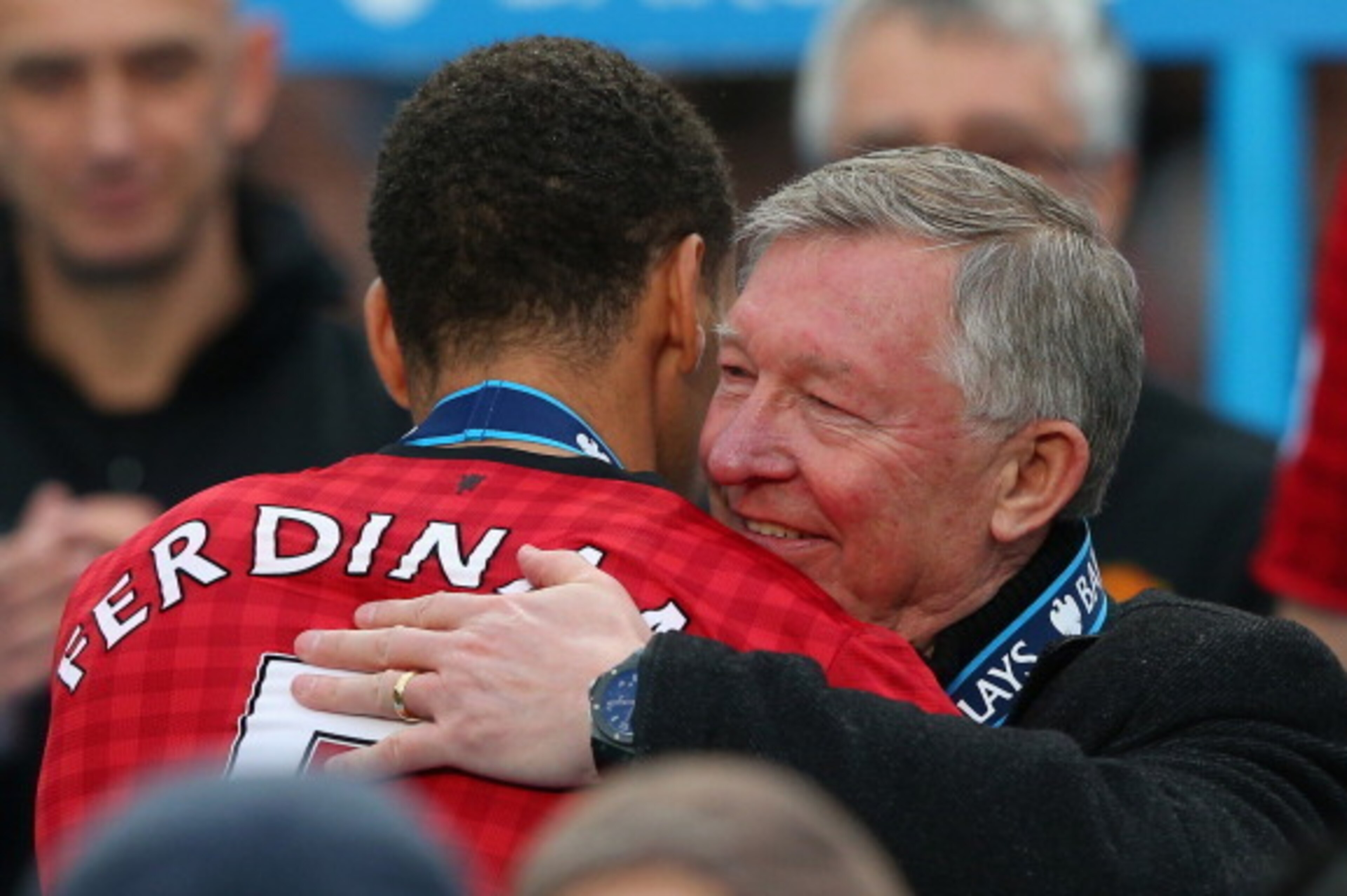 MANCHESTER, ENGLAND - MAY 12:  Manchester United Manager Sir Alex Ferguson embraces Rio Ferdinand following the Barclays Premier League match between Manchester United and Swansea City at Old Trafford on May 12, 2013 in Manchester, England.  (Photo by Ale