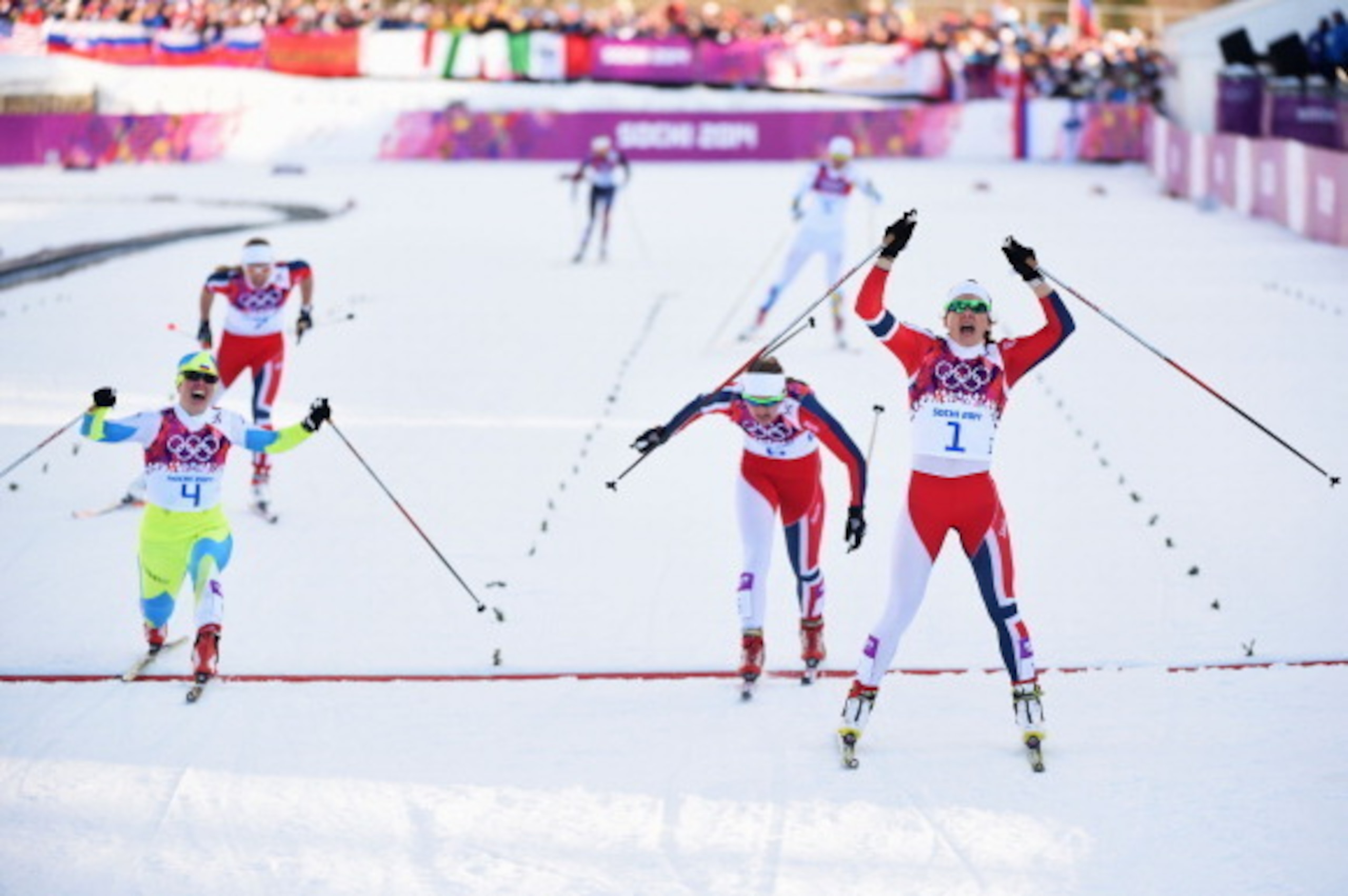 SOCHI, RUSSIA - FEBRUARY 11:  (L-R) Vesna Fabjan of Slovenia wins third place, Ingvild Flugstad Oestberg of Norway wins second place and, Maiken Caspersen Falla of Norway wins first place in the Finals of the Ladies' Sprint Free during day four of the Soc