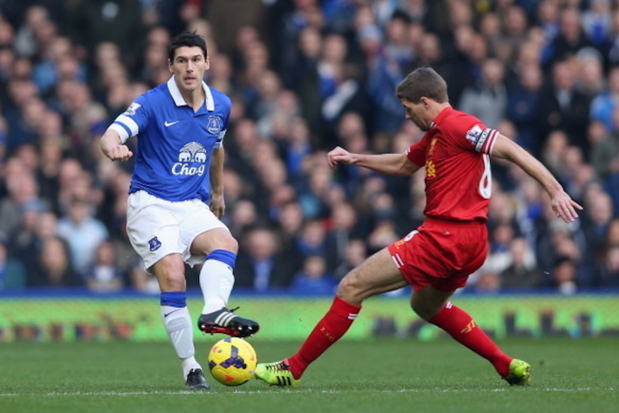 LIVERPOOL, ENGLAND - NOVEMBER 23: Steven Gerrard of Liverpool challenges Gareth Barry of Everton during the Barclays Premier League match between Everton and Liverpool at Goodison Park on November 23, 2013 in Liverpool, England. (Photo by Clive Brunskil LIVERPOOL, ENGLAND - NOVEMBER 23: Steven Gerrard of Liverpool challenges Gareth Barry of Everton during the Barclays Premier League match between Everton and Liverpool at Goodison Park on November 23, 2013 in Liverpool, England. (Photo by Clive Brunskil
