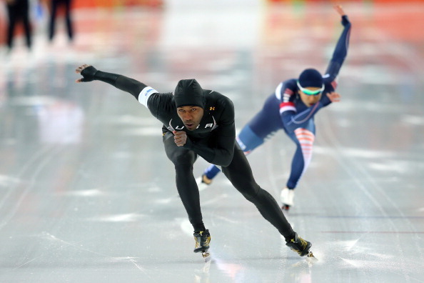 SOCHI, RUSSIA - FEBRUARY 10:  Shani Davis (L) of the United States competes during the Men's 500 m Race 1 of 2 Speed Skating event during day 3 of the Sochi 2014 Winter Olympics at Adler Arena Skating Center on February 10, 2014 in Sochi, Russia.  (Photo 