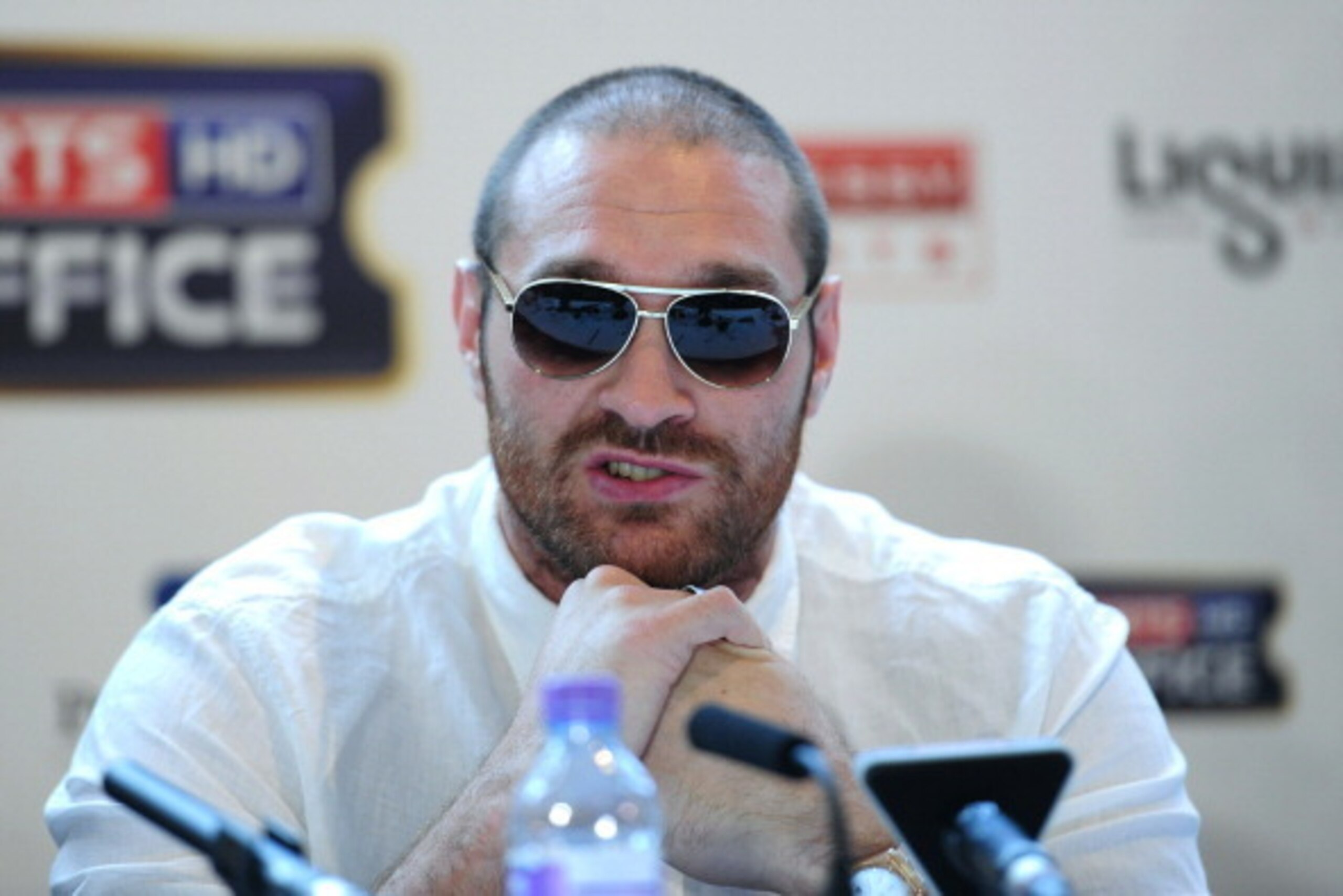 LONDON, ENGLAND - JULY 11: British heavyweight boxer  Tyson Fury speaks during a press conference to announce his upcoming title fight against David Haye on July 11, 2013 in London, England.  (Photo by Shaun Botterill/Getty Images)