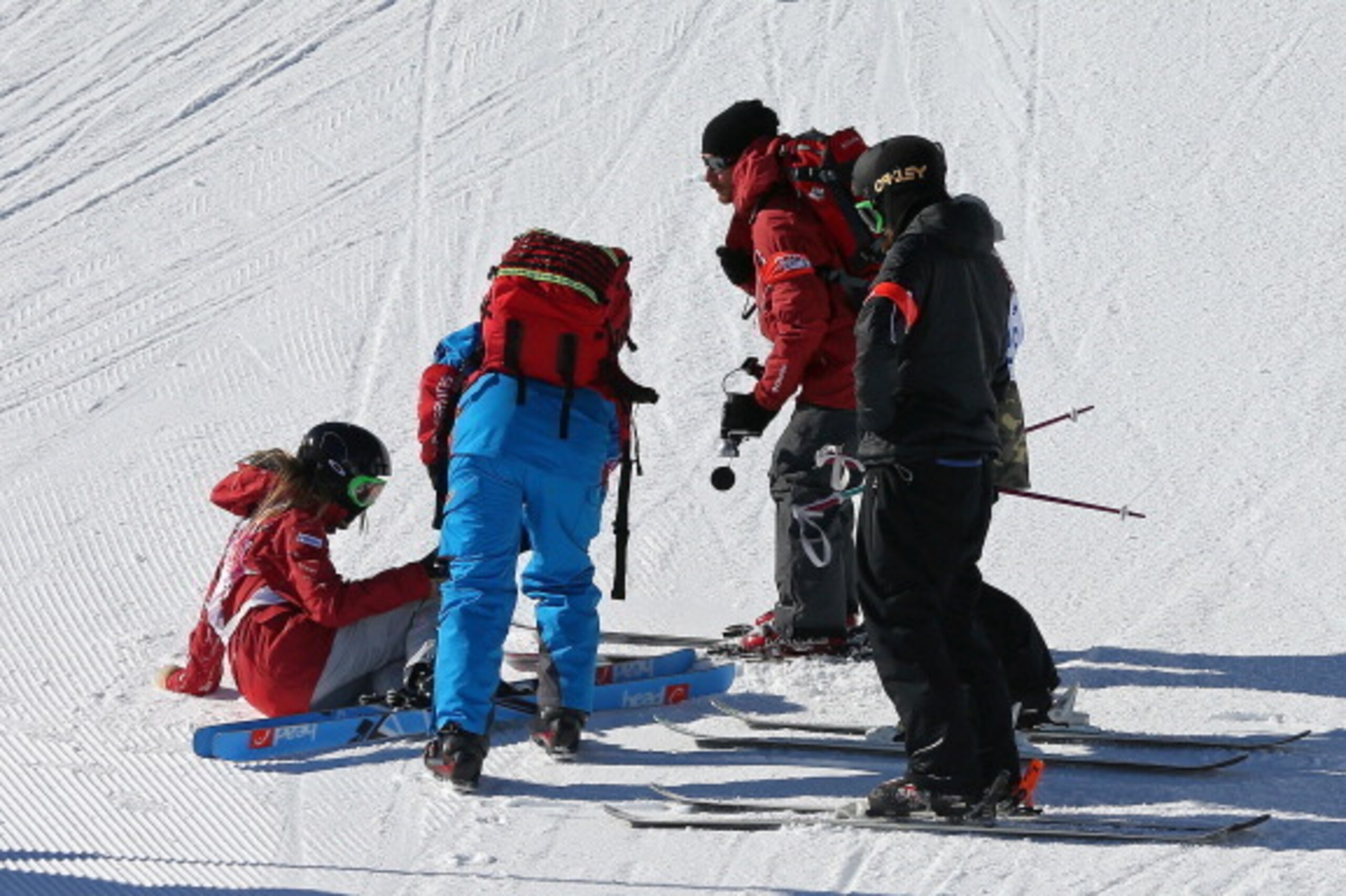 SOCHI, RUSSIA - FEBRUARY 05: Kaya Turski of Canada is treated by medical personnel during training for Ski Slopestyle at the  Extreme Park at Rosa Khutor Mountain on February 5, 2014 in Sochi, Russia.  (Photo by Mike Ehrmann/Getty Images)