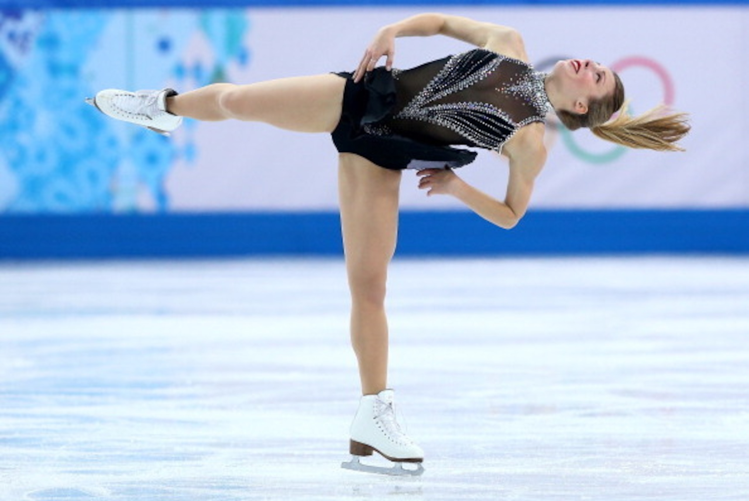 SOCHI, RUSSIA - FEBRUARY 08:  Ashley Wagner of the United States competes in the Figure Skating Team Ladies Short Program during day one of the Sochi 2014 Winter Olympics at Iceberg Skating Palace on February 8, 2014 in Sochi, Russia.  (Photo by Streeter 