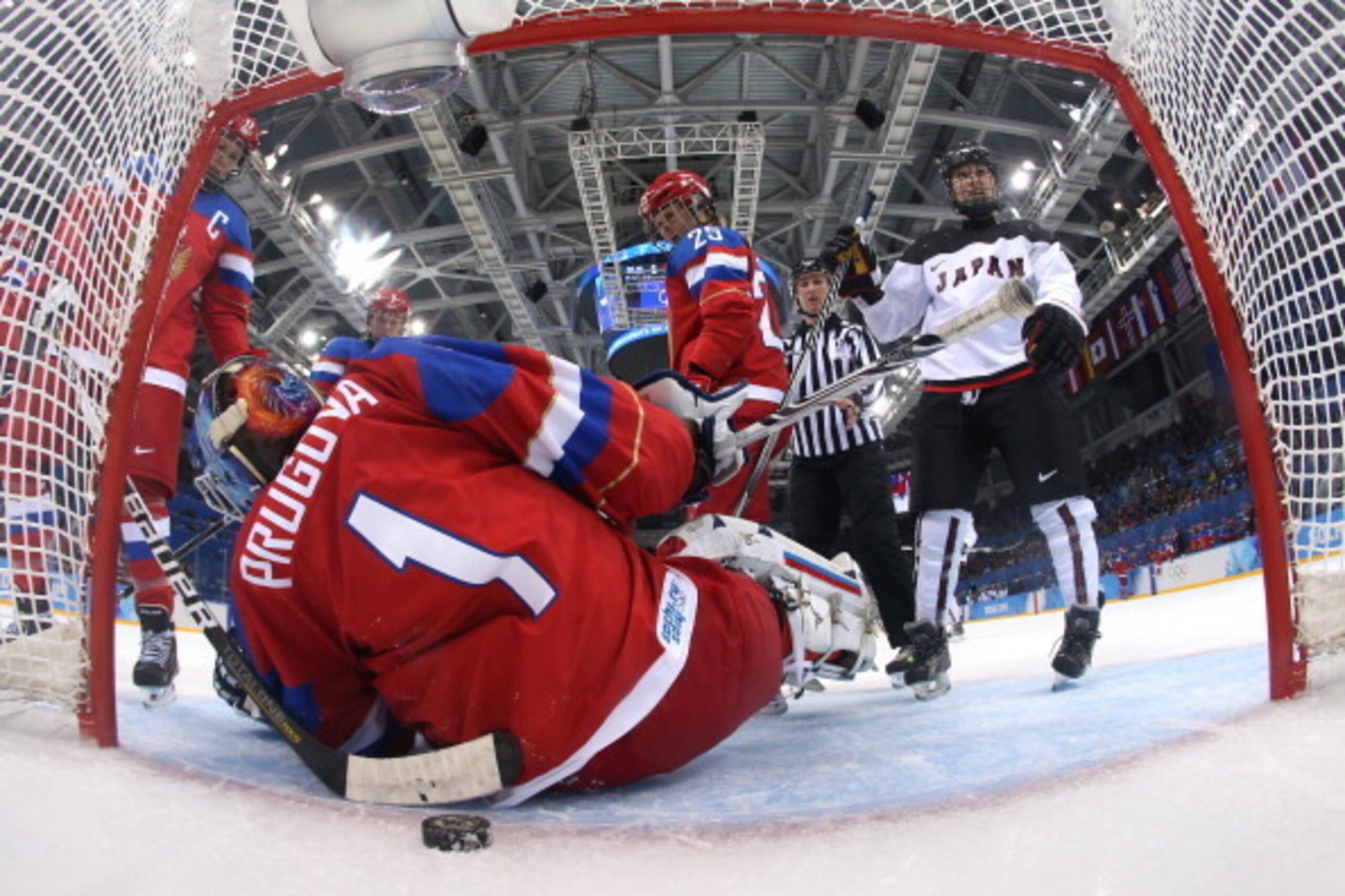 SOCHI, RUSSIA - FEBRUARY 11:  Anna Prugova #1 of Russia tends goal against Japan during the Women's Ice Hockey Preliminary Round Group B game on day four of the Sochi 2014 Winter Olympics at Shayba Arena on February 11, 2014 in Sochi, Russia.  (Photo by M
