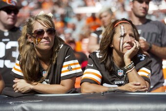 CLEVELAND, OH - SEPTEMBER 8: Cleveland Browns fans watch the final minutes of the game against the Miami Dolphins during the second half at First Energy Stadium on September 8, 2013 in Cleveland, Ohio. The Dolphins defeated the Browns 23-10. (Photo by Jas