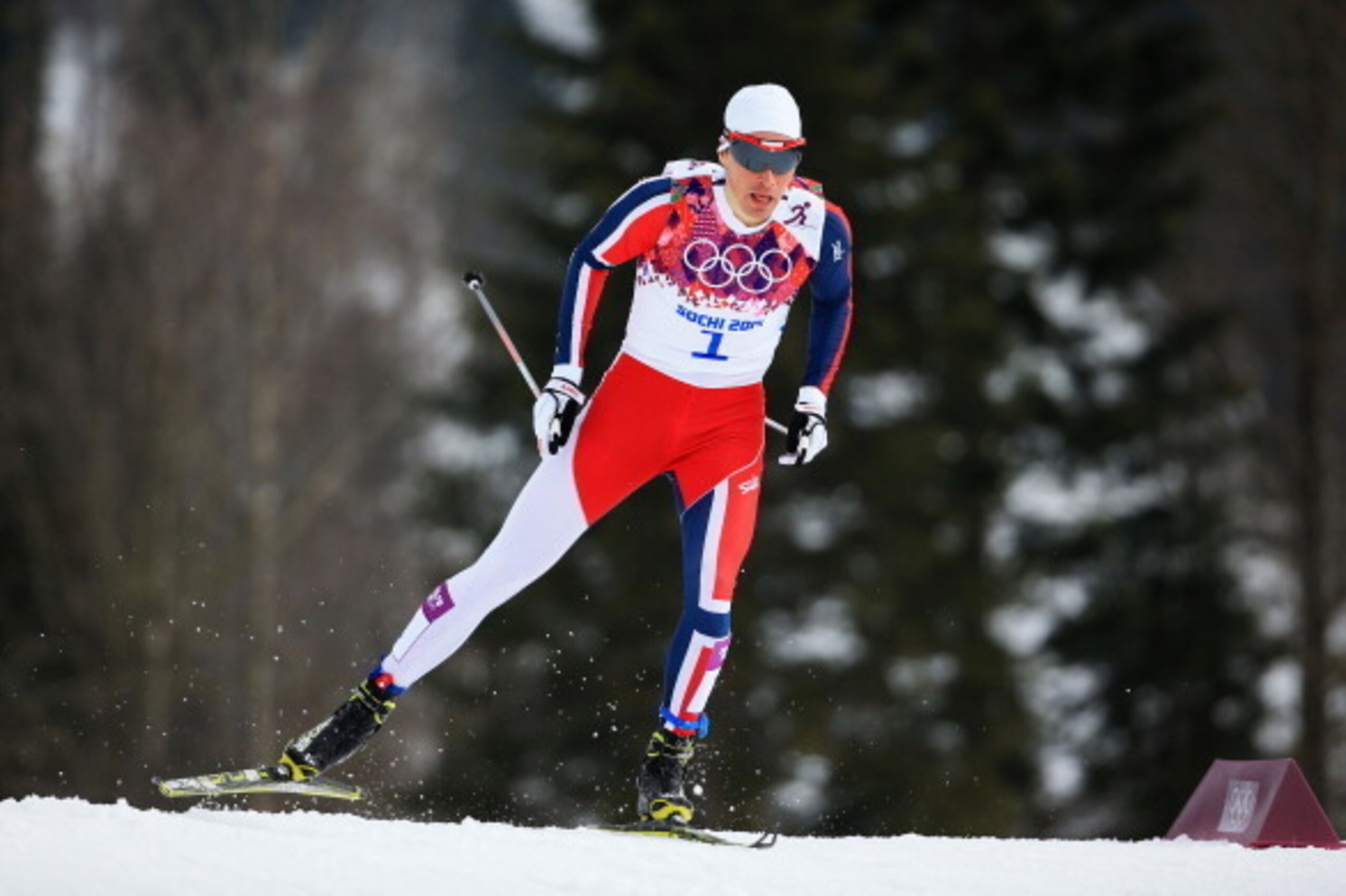 SOCHI, RUSSIA - FEBRUARY 11:  Ola Vigen Hattestad of Norway competes in Qualification of the Men's Sprint Free during day four of the Sochi 2014 Winter Olympics at Laura Cross-country Ski & Biathlon Center on February 11, 2014 in Sochi, Russia.  (Photo by
