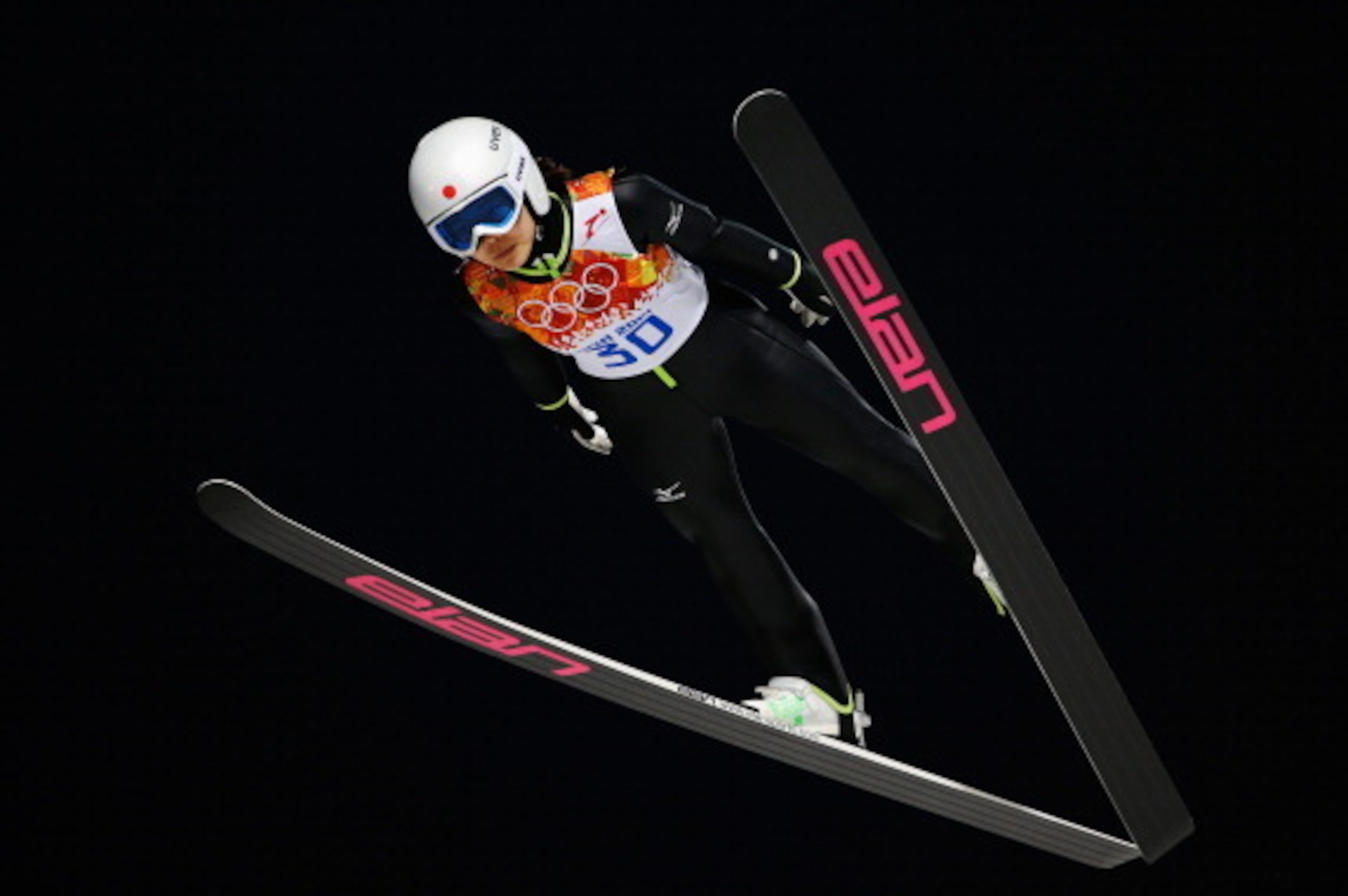 SOCHI, RUSSIA - FEBRUARY 11: Sara Takanashi of Japan jumps during the Ladies' Normal Hill Individual first round on day 4 of the Sochi 2014 Winter Olympics at the RusSki Gorki Ski Jumping Center on February 11, 2014 in Sochi, Russia.  (Photo by Ezra Shaw/