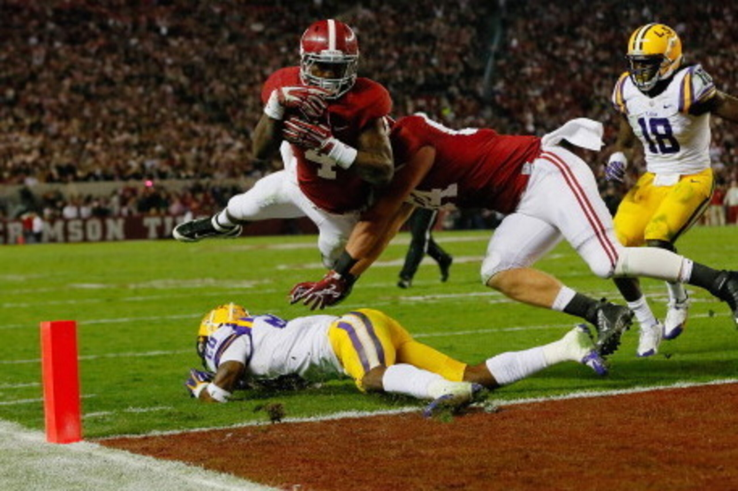 TUSCALOOSA, AL - NOVEMBER 09:  T.J. Yeldon #4 of the Alabama Crimson Tide scores a touchdown in the third quarter against the LSU Tigers at Bryant-Denny Stadium on November 9, 2013 in Tuscaloosa, Alabama.  (Photo by Kevin C. Cox/Getty Images)