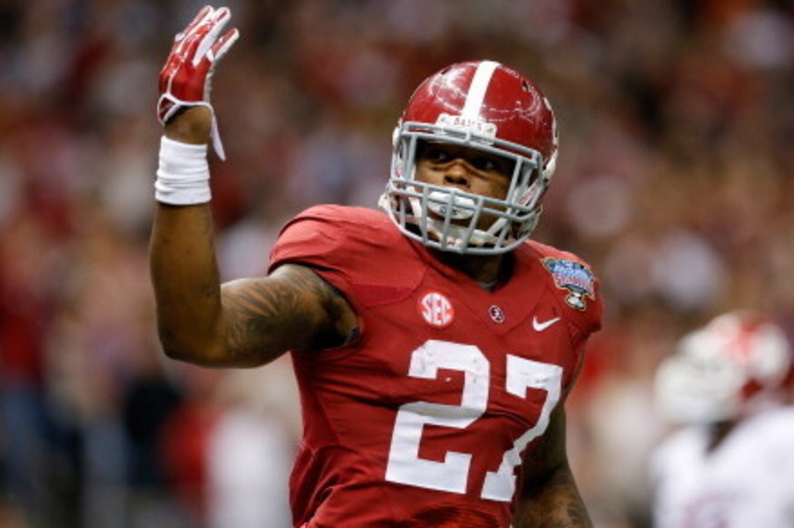 NEW ORLEANS, LA - JANUARY 02:  Derrick Henry #27 of the Alabama Crimson Tide celebrates after scoring a touchdown against the Oklahoma Sooners during the Allstate Sugar Bowl at the Mercedes-Benz Superdome on January 2, 2014 in New Orleans, Louisiana.  (Ph