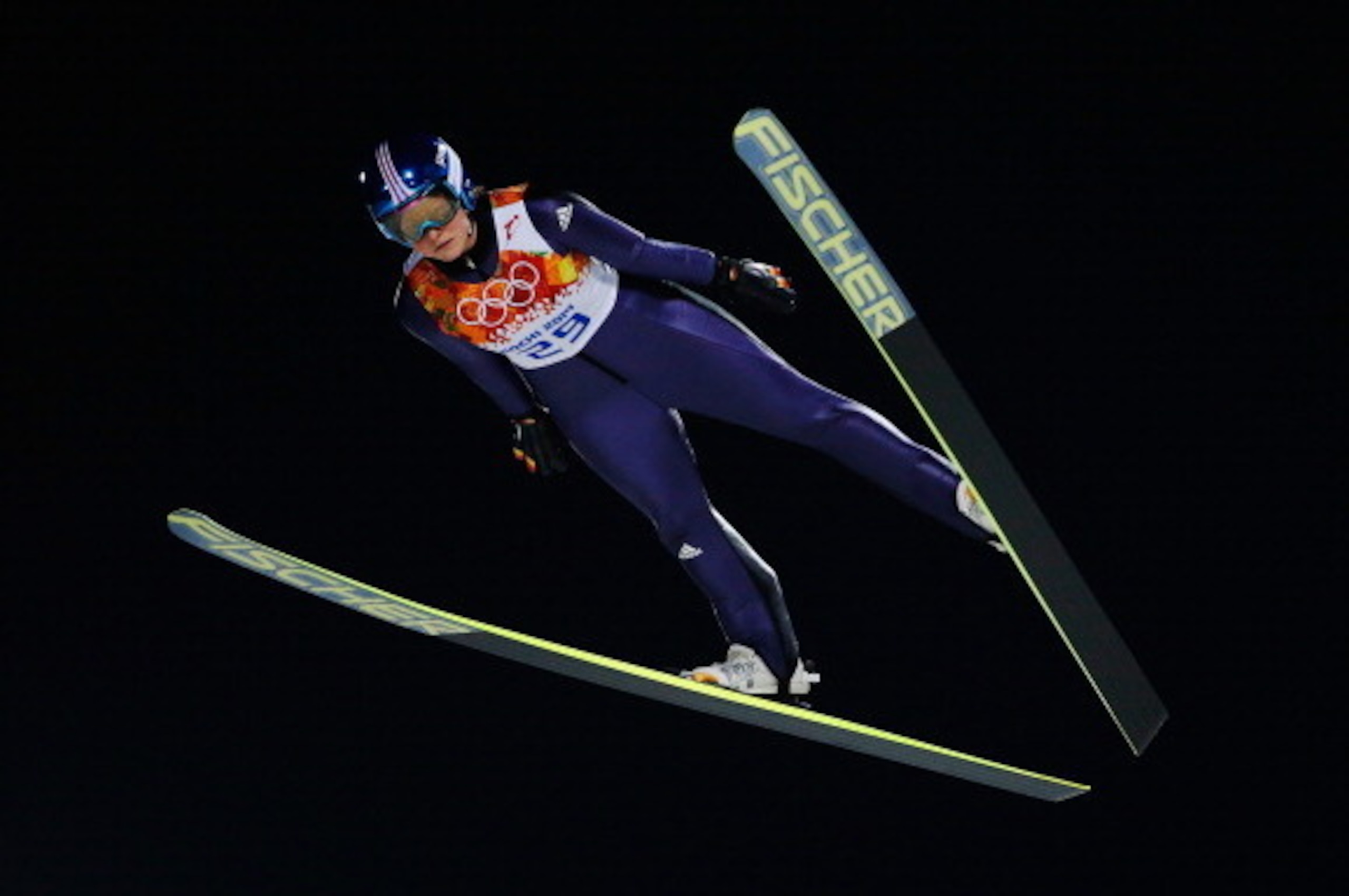 SOCHI, RUSSIA - FEBRUARY 11: Carina Vogt of Germany jumps during the Ladies' Normal Hill Individual first round on day 4 of the Sochi 2014 Winter Olympics at the RusSki Gorki Ski Jumping Center on February 11, 2014 in Sochi, Russia. (Photo by Ezra Shaw/G SOCHI, RUSSIA - FEBRUARY 11: Carina Vogt of Germany jumps during the Ladies' Normal Hill Individual first round on day 4 of the Sochi 2014 Winter Olympics at the RusSki Gorki Ski Jumping Center on February 11, 2014 in Sochi, Russia. (Photo by Ezra Shaw/G