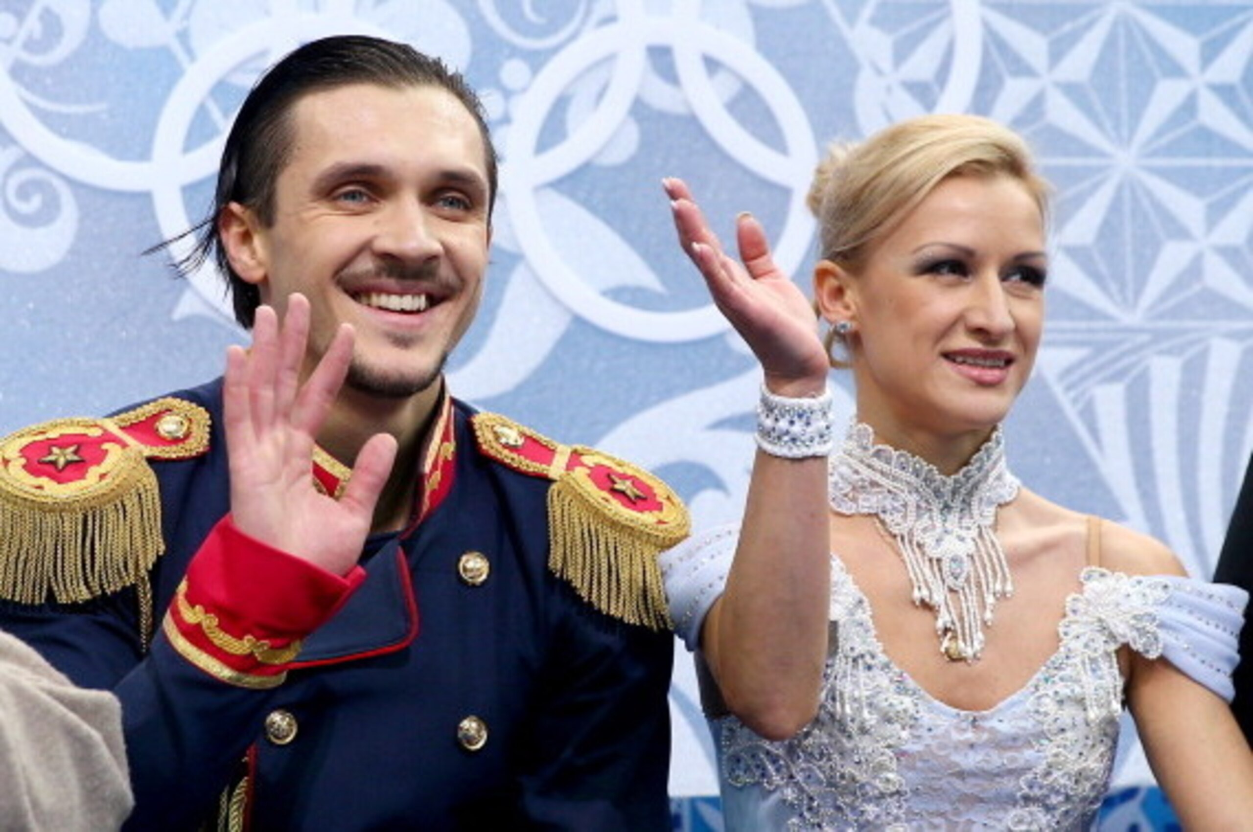 SOCHI, RUSSIA - FEBRUARY 11:  Maxim Trankov and Tatiana Volosozhar of Russia wait for their score during the Figure Skating Pairs Short Program on day four of the Sochi 2014 Winter Olympics at Iceberg Skating Palace on February 11, 2014 in Sochi, Russia. 