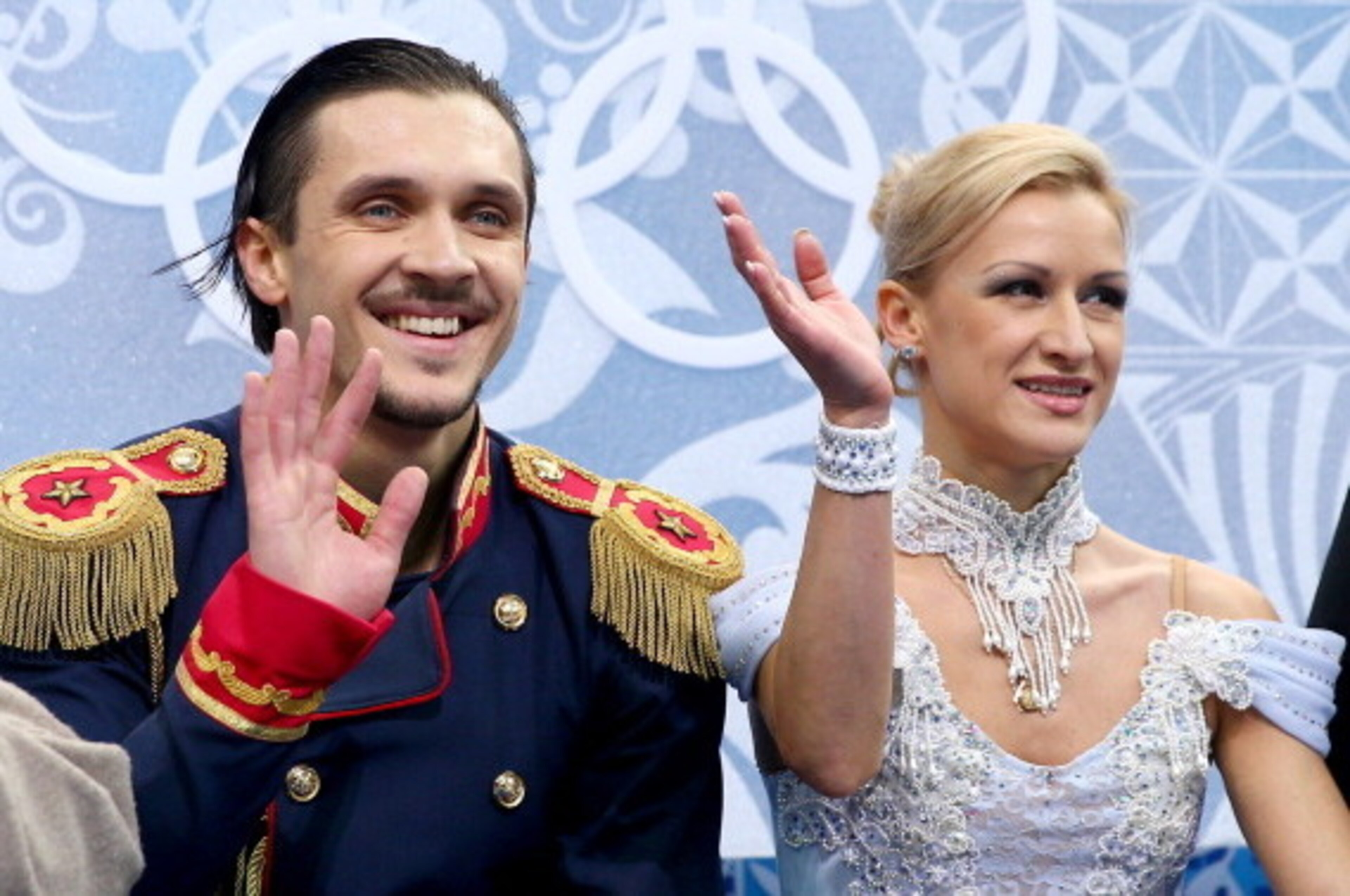 SOCHI, RUSSIA - FEBRUARY 11:  Maxim Trankov and Tatiana Volosozhar of Russia wait for their score during the Figure Skating Pairs Short Program on day four of the Sochi 2014 Winter Olympics at Iceberg Skating Palace on February 11, 2014 in Sochi, Russia. 