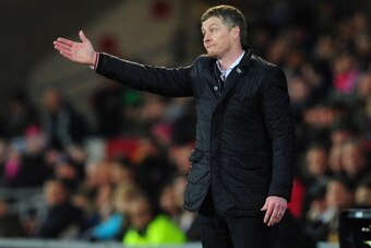 CARDIFF, WALES - FEBRUARY 11:  Cardiff manager Ole Gunnar Solskjaer reacts during  the Barclays Premier League match between Cardiff City and Aston Villa at Cardiff City Stadium on February 11, 2014 in Cardiff, Wales.  (Photo by Stu Forster/Getty Images)