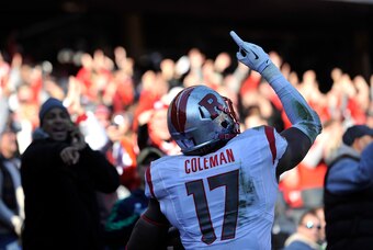 Dec 28, 2013; Bronx, NY, USA; Rutgers Scarlet Knights wide receiver Brandon Coleman (17) celebrates a touchdown against the Notre Dame Fighting Irish during the first half of the Pinstripe Bowl at Yankees Stadium. Notre Dame Fighting Irish won the game 29