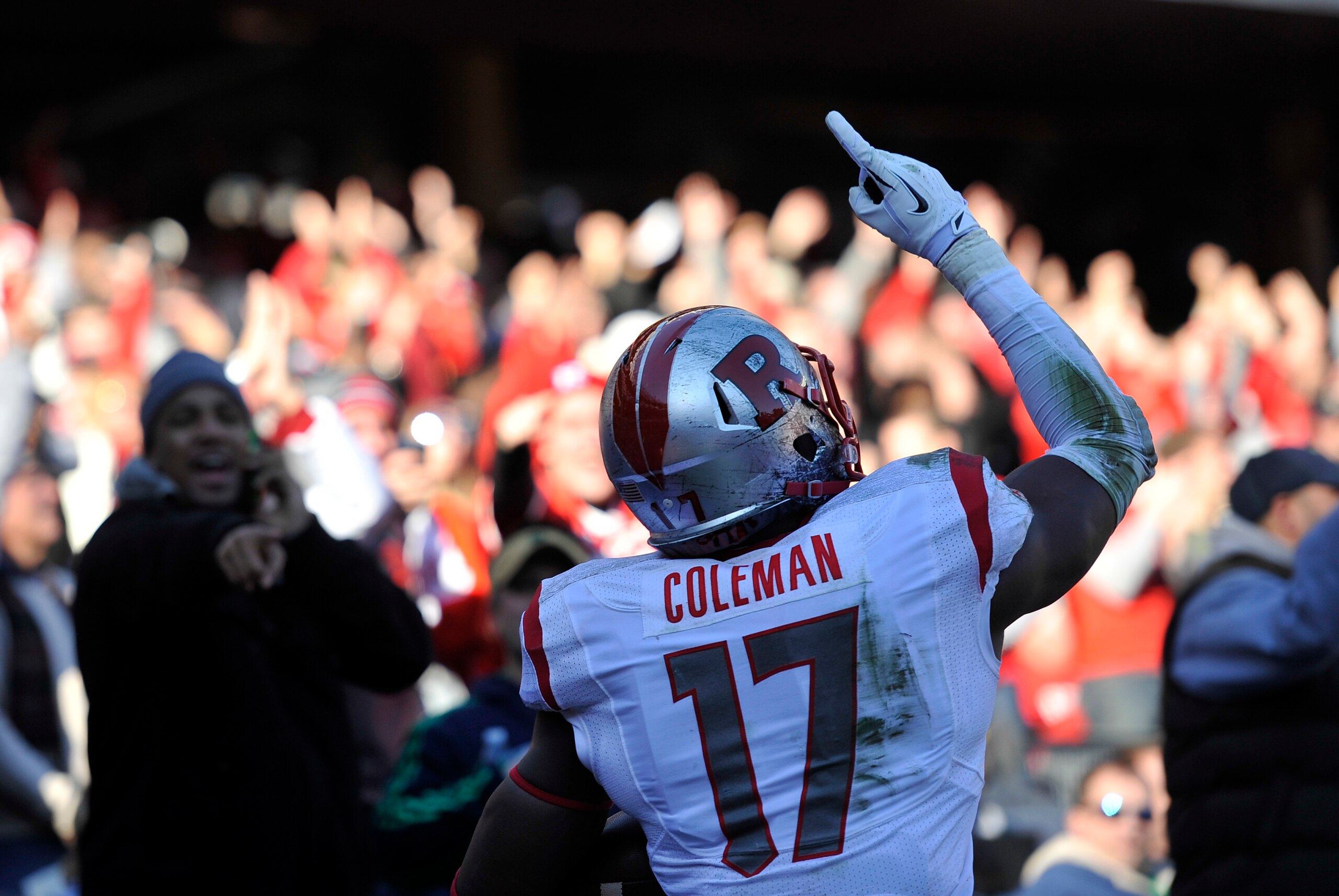 Dec 28, 2013; Bronx, NY, USA; Rutgers Scarlet Knights wide receiver Brandon Coleman (17) celebrates a touchdown against the Notre Dame Fighting Irish during the first half of the Pinstripe Bowl at Yankees Stadium. Notre Dame Fighting Irish won the game 29