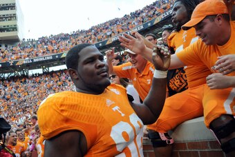 Oct 19, 2013; Knoxville, TN, USA; Tennessee Volunteers defensive lineman Daniel McCullers (98) reacts after defeating the South Carolina Gamecocks on a last second field goal at Neyland Stadium. Tennessee won 23 to 21.  Mandatory Credit: Randy Sartin-USA