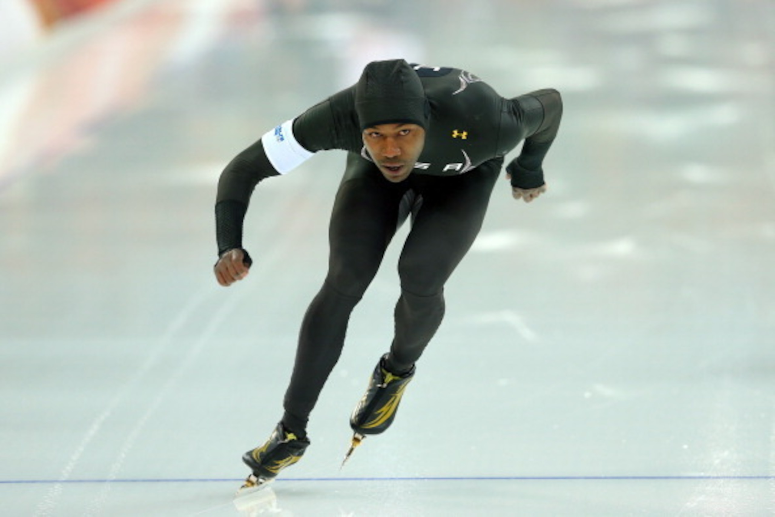 SOCHI, RUSSIA - FEBRUARY 10:  Shani Davis of the United States competes during the Men's 500 m Race 1 of 2 Speed Skating event during day 3 of the Sochi 2014 Winter Olympics at Adler Arena Skating Center on February 10, 2014 in Sochi, Russia.  (Photo by Q