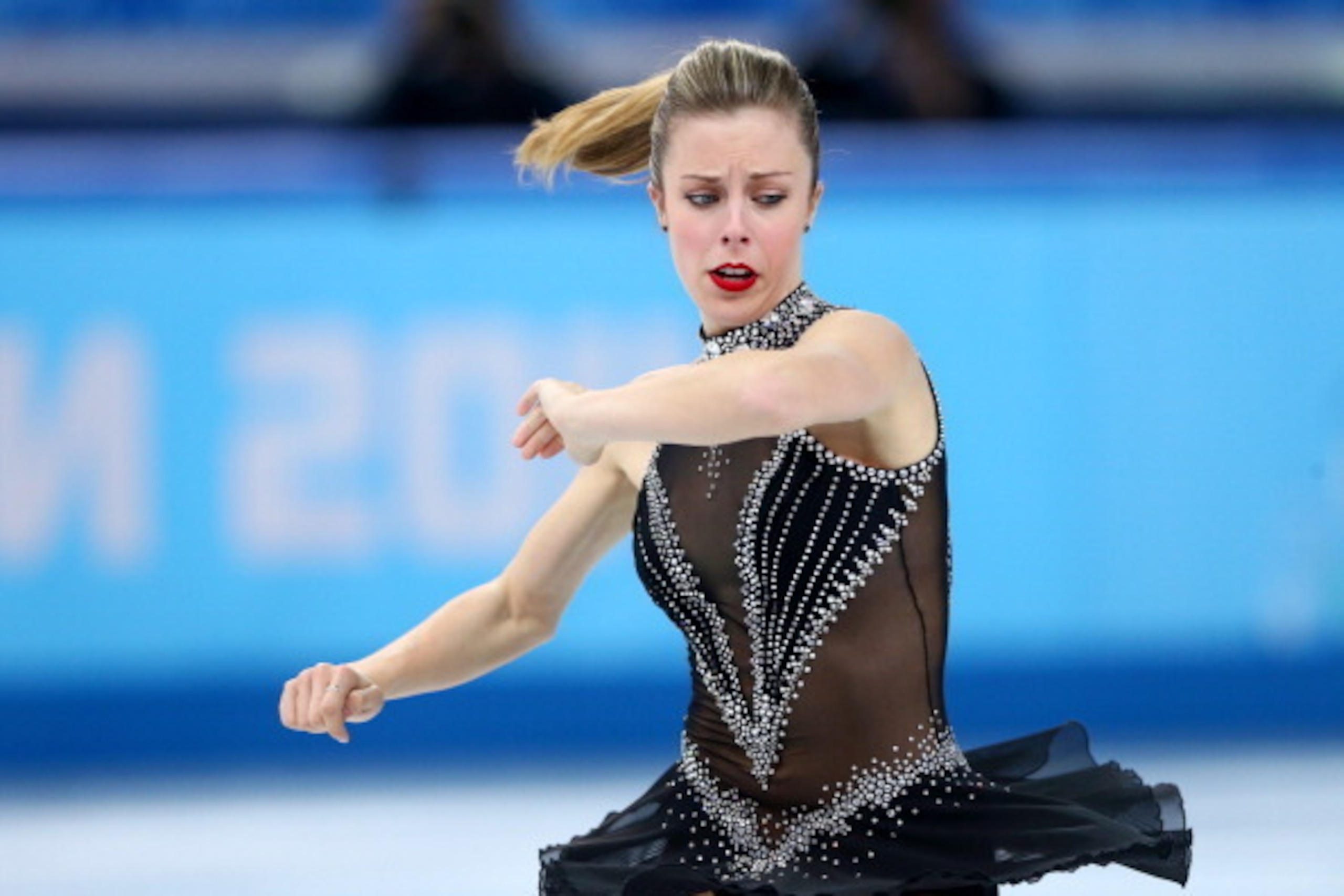 SOCHI, RUSSIA - FEBRUARY 08:  Ashley Wagner of the United States competes in the Figure Skating Team Ladies Short Program during day one of the Sochi 2014 Winter Olympics at Iceberg Skating Palace on February 8, 2014 in Sochi, Russia.  (Photo by Streeter 