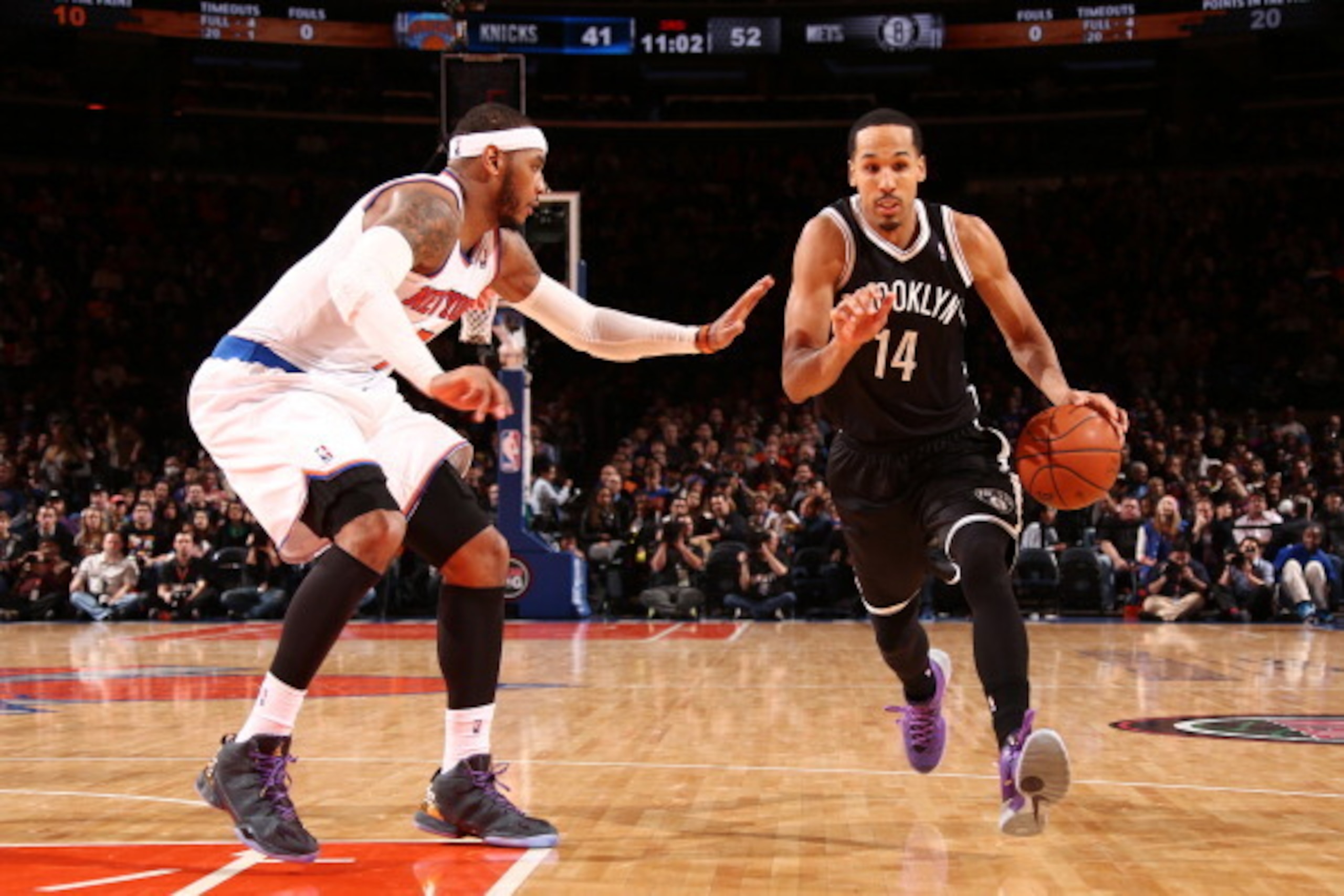 NEW YORK, NY - JANUARY 20: Shaun Livingston #14 of the Brooklyn Nets dribbles against Carmelo Anthony #7 of the New York Knicks during a game at Madison Square Garden in New York City on January 20, 2014. NOTE TO USER: User expressly acknowledges and agr NEW YORK, NY - JANUARY 20: Shaun Livingston #14 of the Brooklyn Nets dribbles against Carmelo Anthony #7 of the New York Knicks during a game at Madison Square Garden in New York City on January 20, 2014. NOTE TO USER: User expressly acknowledges and agr