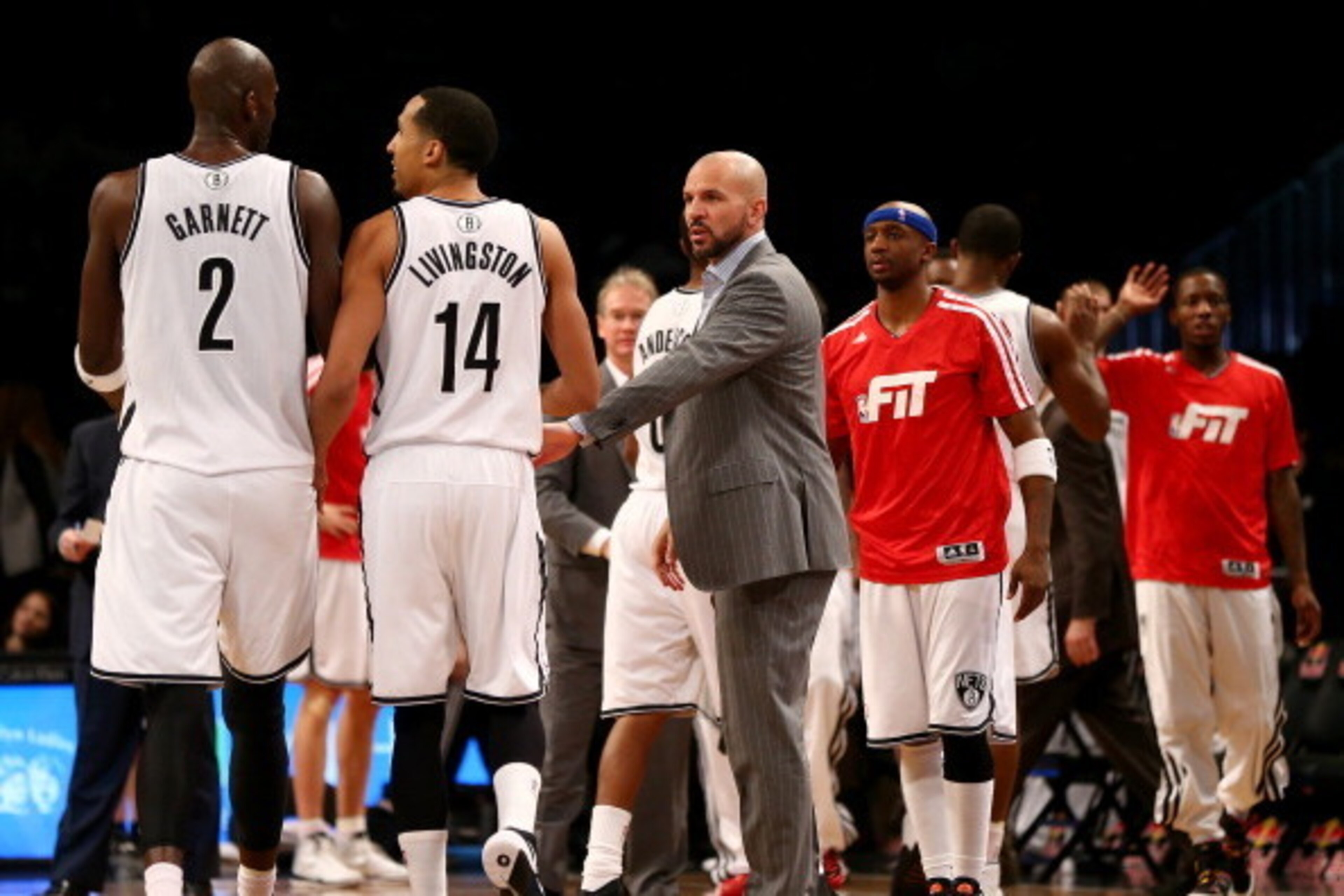 BROOKLYN, NY - JANUARY 06:  Head coach Jason Kidd of the Brooklyn Nets talks with his players during a time out in the second half against the Atlanta Hawks at the Barclays Center on January 6, 2014 in the Brooklyn borough of New York City.The Brooklyn Ne