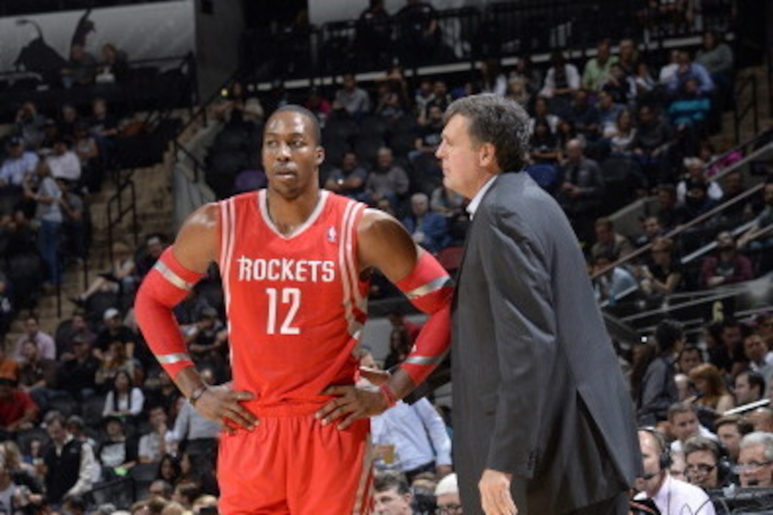 SAN ANTONIO, TX - OCTOBER 24: Head Coach, Kevin McHale, shares a word with Dwight Howard #12 of the Houston Rockets during the last preseason game against the San Antonio Spurs at the AT&T Center on October 24, 2013 in San Antonio, Texas. NOTE TO USER: Us