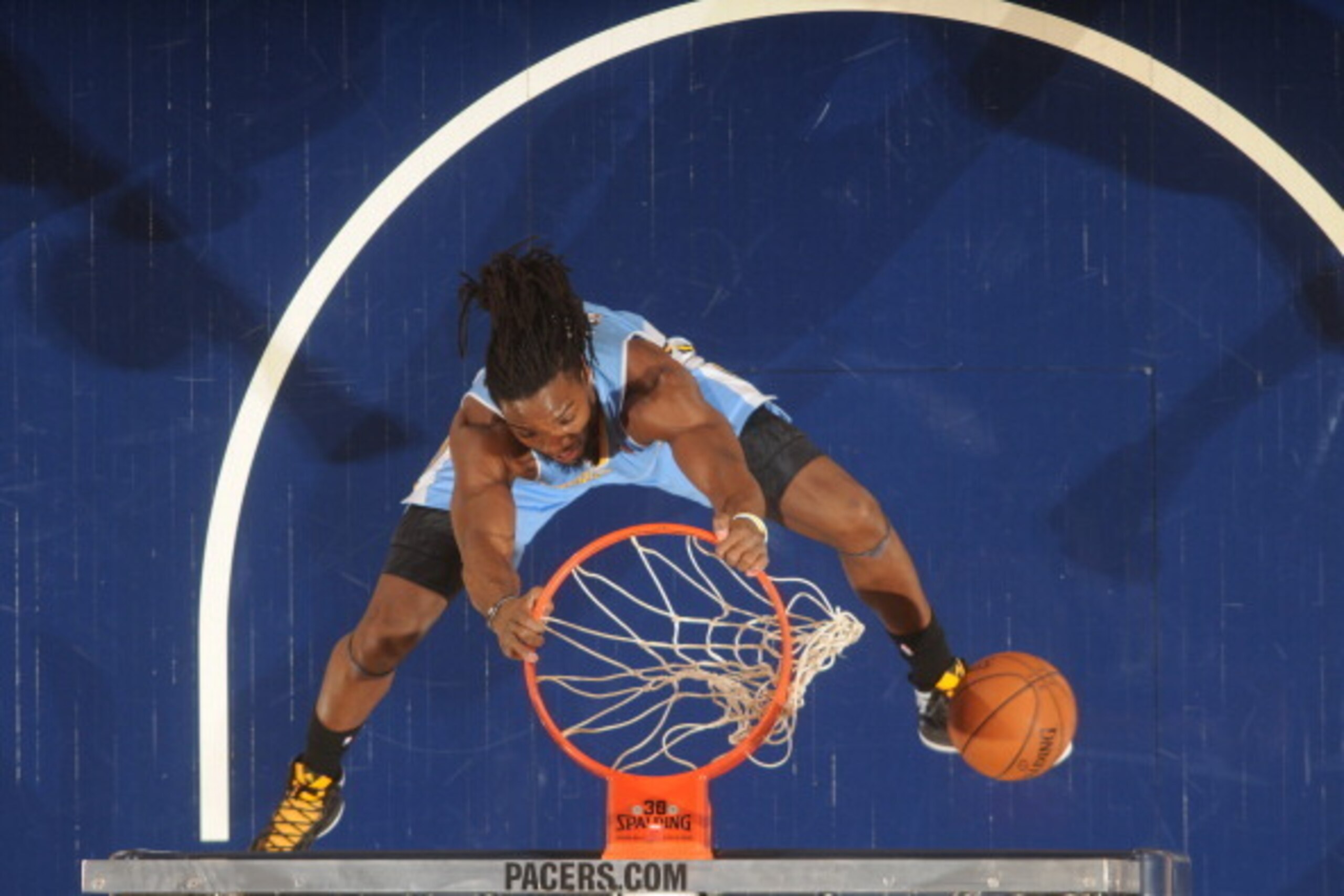 INDIANAPOLIS - FEBRUARY 10: Kenneth Faried #35 of the Denver Nuggets dunks the ball against the Indiana Pacers at Bankers Life Fieldhouse on February 10, 2014 in Indianapolis, Indiana.  NOTE TO USER: User expressly acknowledges and agrees that, by downloa