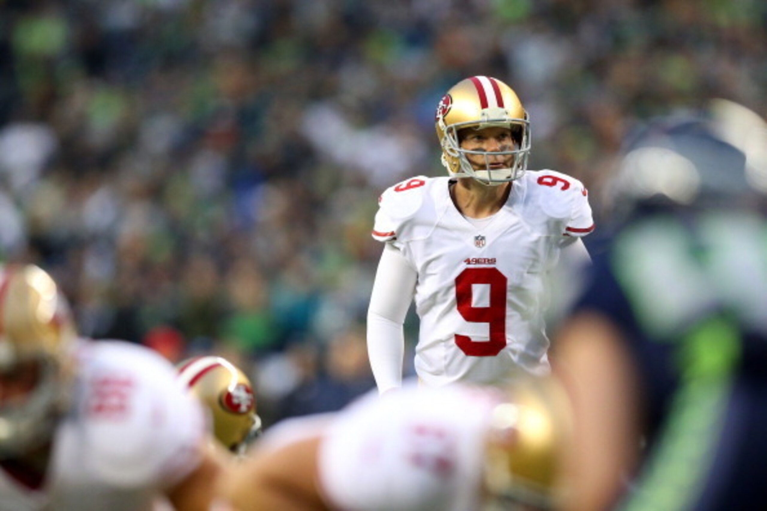 SEATTLE, WA - JANUARY 19: Kicker Phil Dawson #9 of the San Francisco 49ers lines up an extra point against the Seattle Seahawks during the 2014 NFC Championship at CenturyLink Field on January 19, 2014 in Seattle, Washington.  (Photo by Ronald Martinez/Ge