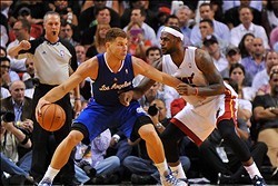 Nov 7, 2013; Miami, FL, USA; Los Angeles Clippers power forward Blake Griffin (32) is pressured by Miami Heat small forward LeBron James (6) during the second half at American Airlines Arena. Mandatory Credit: Steve Mitchell-USA TODAY Sports