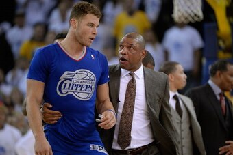 OAKLAND, CA - DECEMBER 25:  Head Coach Doc Rivers of the Los Angeles Clippers comes out on the court to get Blake Griffin #32 who was ejected for his second flagrant foul against the Golden State Warriors during the fourth quarter at ORACLE Arena on Decem
