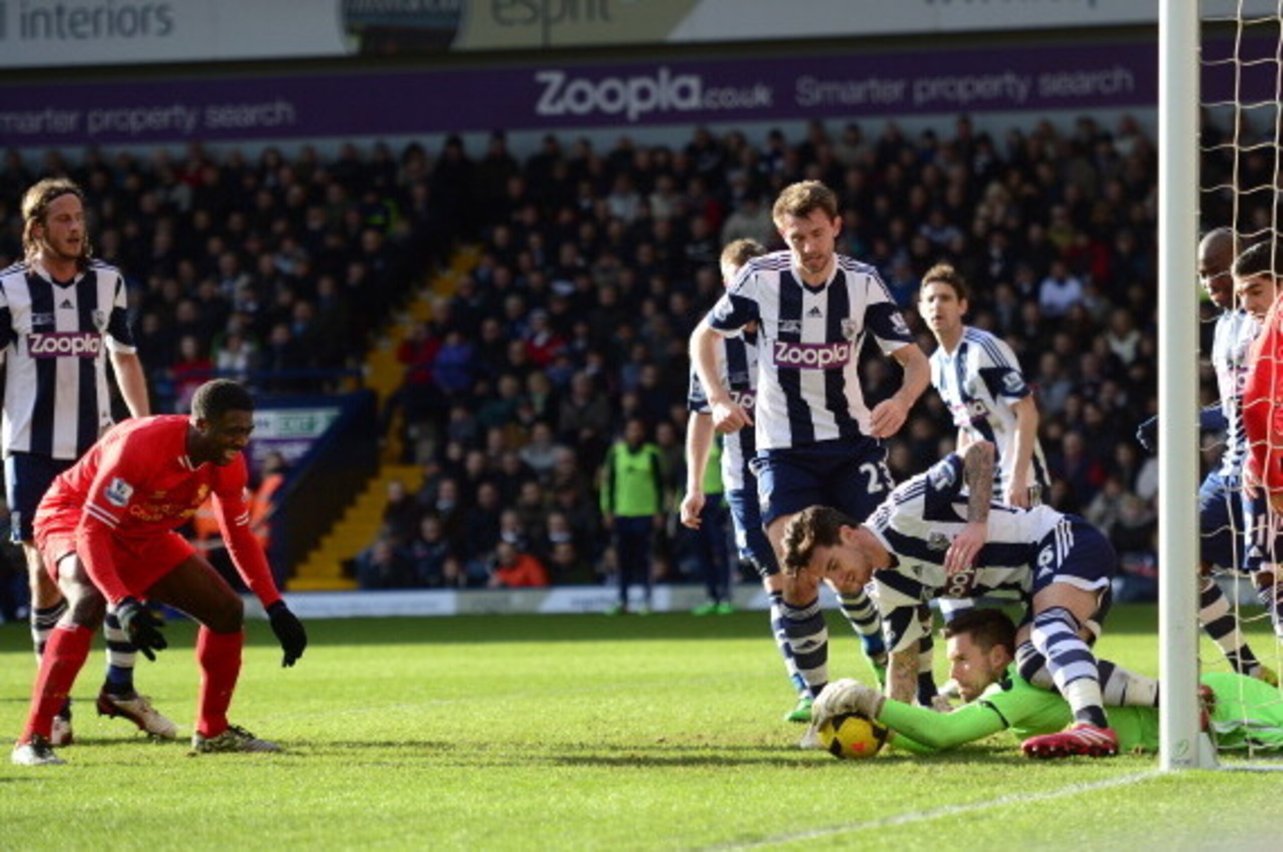 WEST BROMWICH, ENGLAND - FEBRUARY 02:  Kolo Toure of Liverpool reacts as goalkeeper Ben Foster of West Bromwich saves his shot on goal during the Barclays Premier League match between West Bromwich Albion and Liverpool at The Hawthorns on February 2, 2014