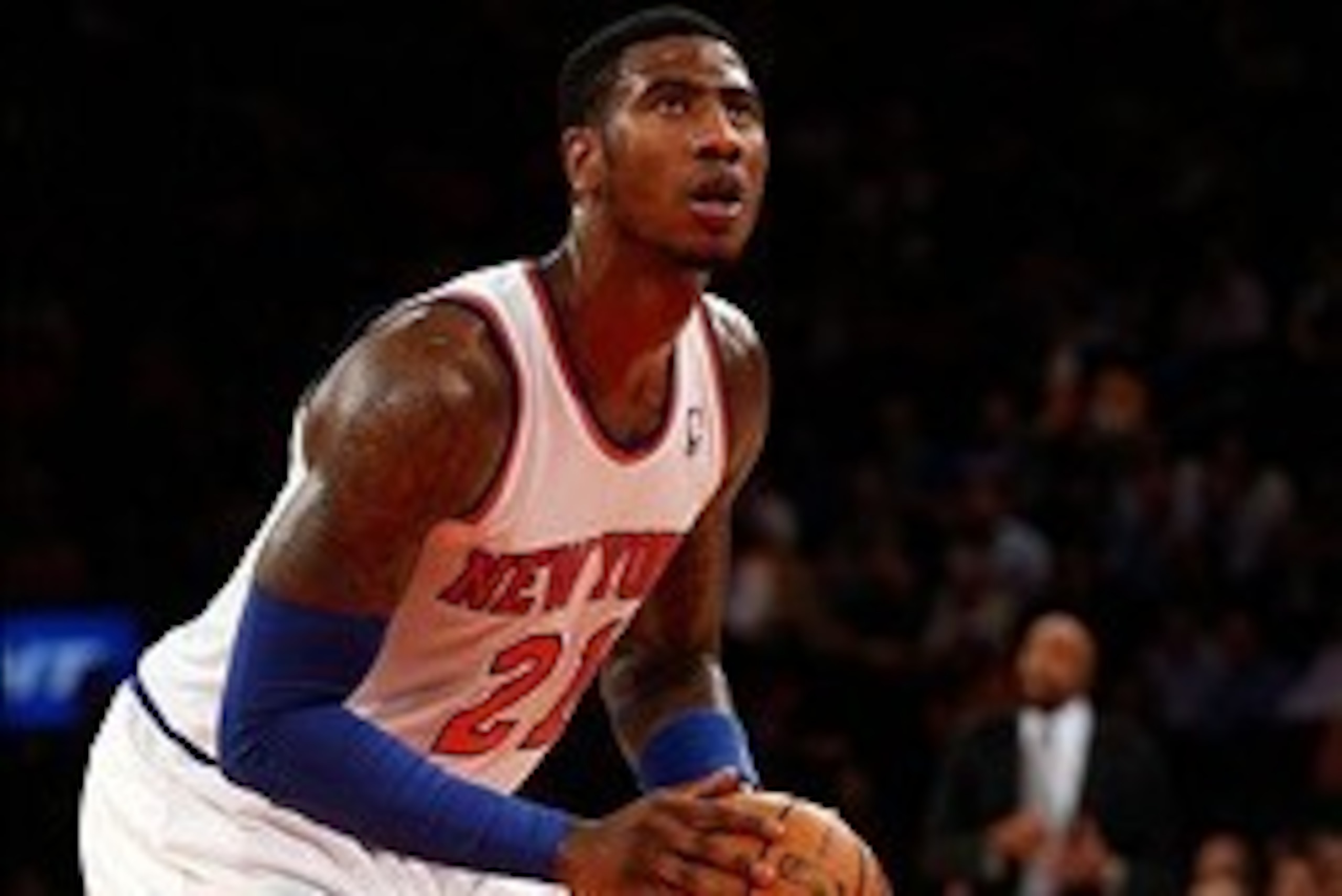 Oct 30, 2013; New York, NY, USA;  New York Knicks shooting guard Iman Shumpert (21) takes a free throw during the fourth quarter against the Milwaukee Bucks at Madison Square Garden. Knicks won 90-83.  Mandatory Credit: Anthony Gruppuso-USA TODAY Sports