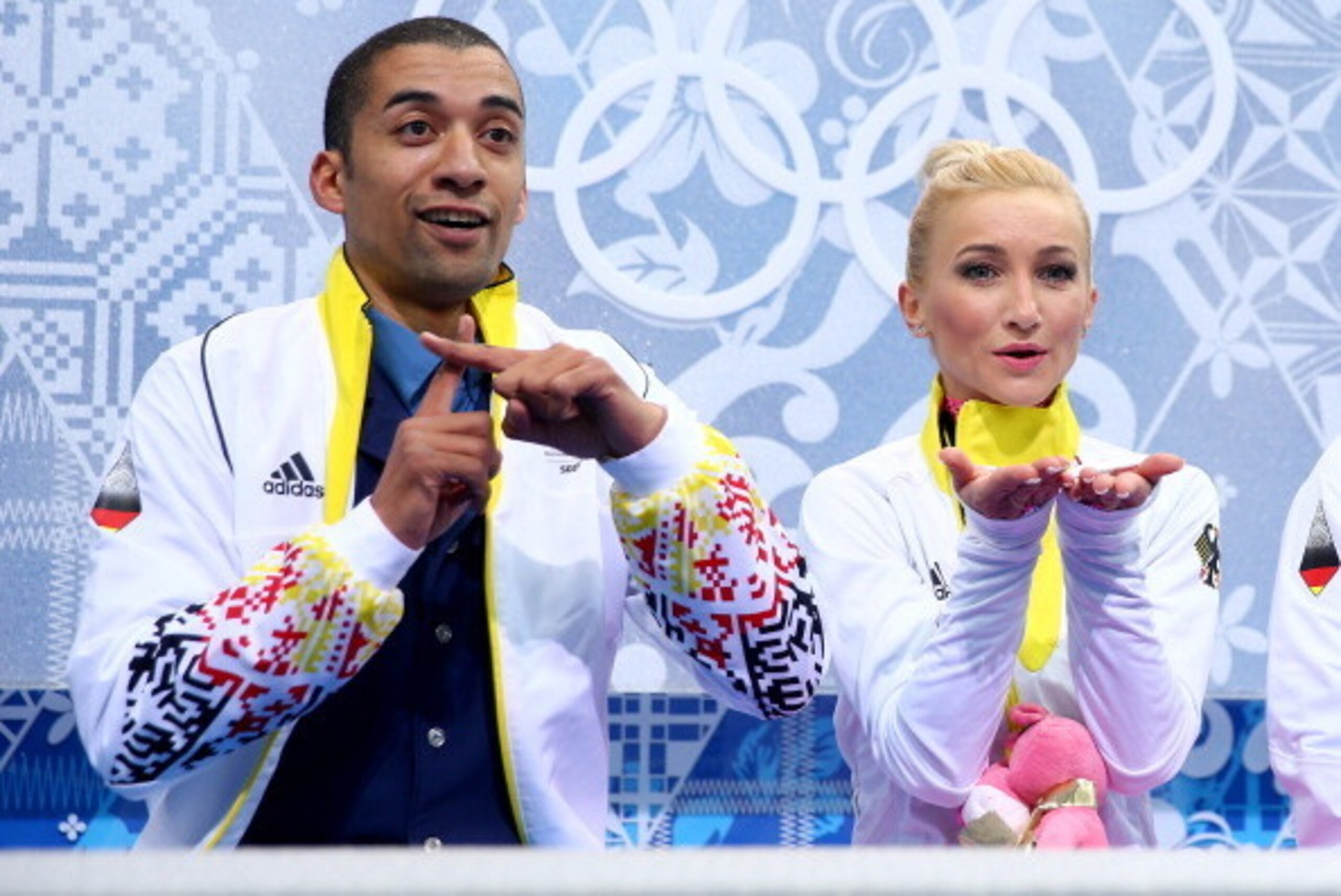 SOCHI, RUSSIA - FEBRUARY 11:  Robin Szolkowy and Aliona Savchenko of Germany wait for their score during the Figure Skating Pairs Short Program on day four of the Sochi 2014 Winter Olympics at Iceberg Skating Palace on February 11, 2014 in Sochi, Russia. 