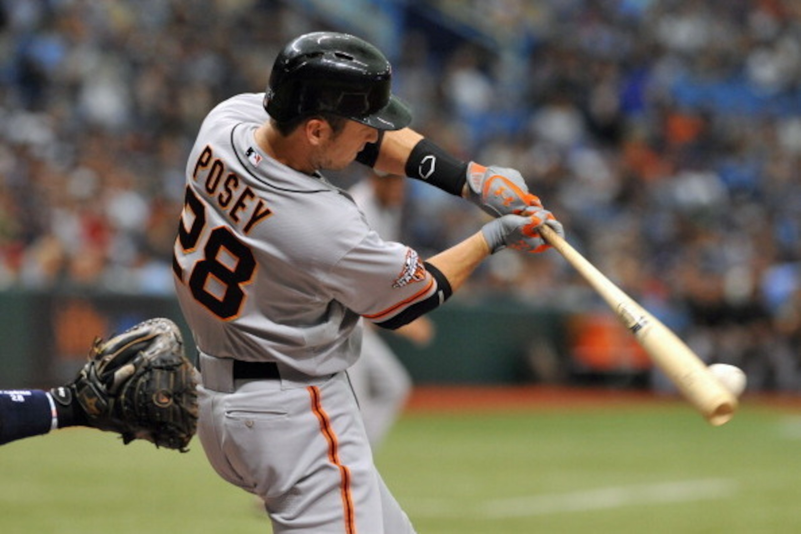 ST. PETERSBURG, FL - AUGUST 4:  Designated hitter Buster Posey #28 of the San Francisco Giants bats in the first inning against the Tampa Bay Rays August 4, 2013 at Tropicana Field in St. Petersburg, Florida. (Photo by Al Messerschmidt/Getty Images)